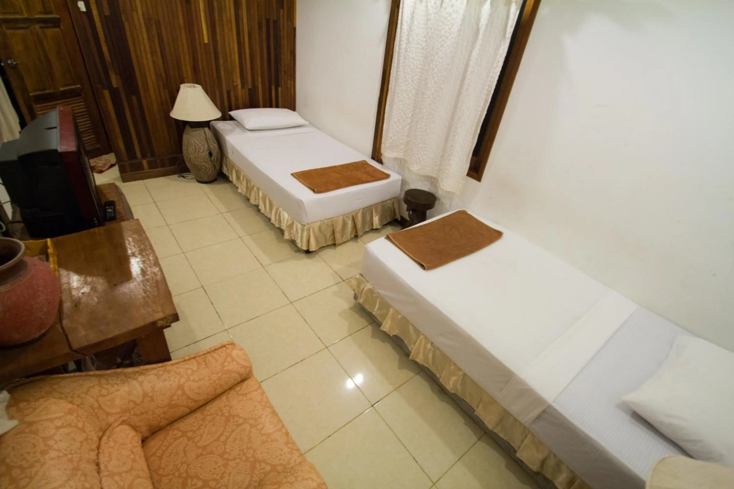 Bed in Tropical Garden Bungalow