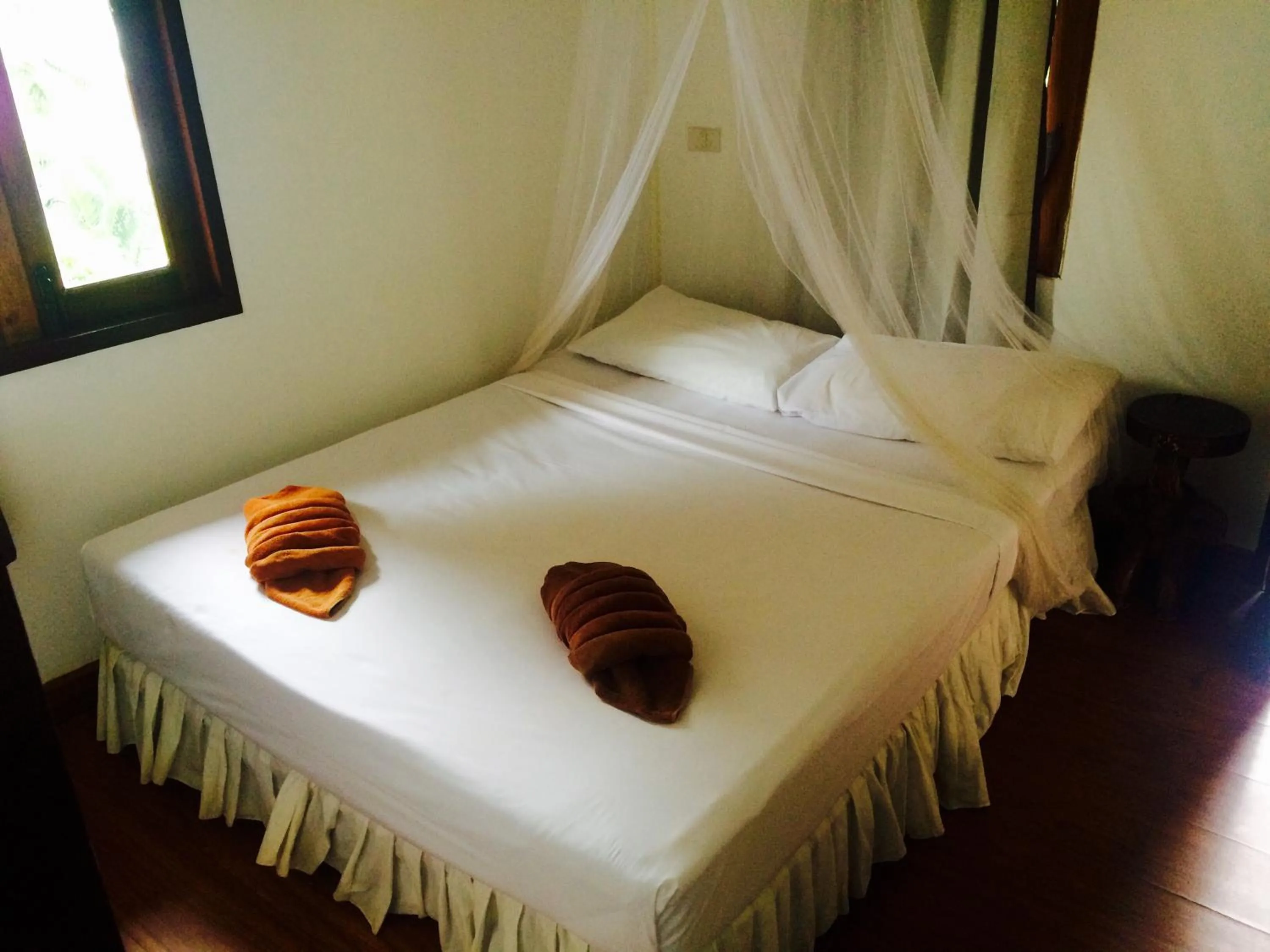 Bed in Tropical Garden Bungalow
