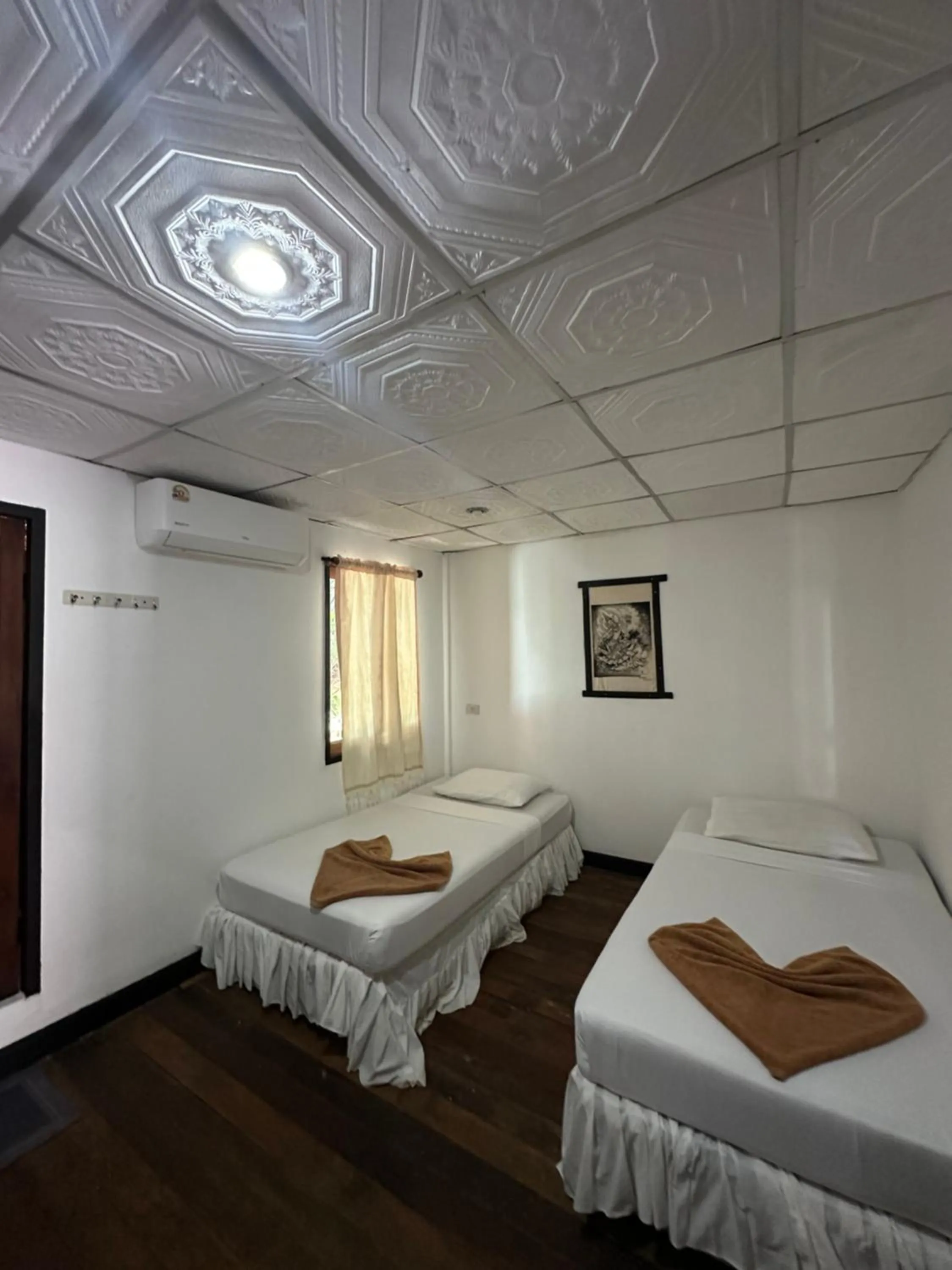 Bed in Tropical Garden Bungalow