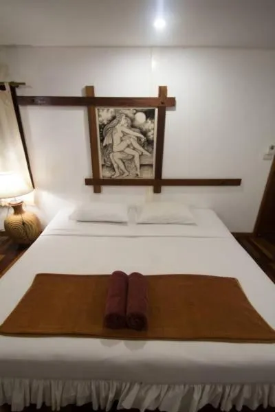 Bed in Tropical Garden Bungalow