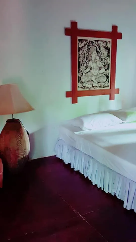 Bed in Tropical Garden Bungalow