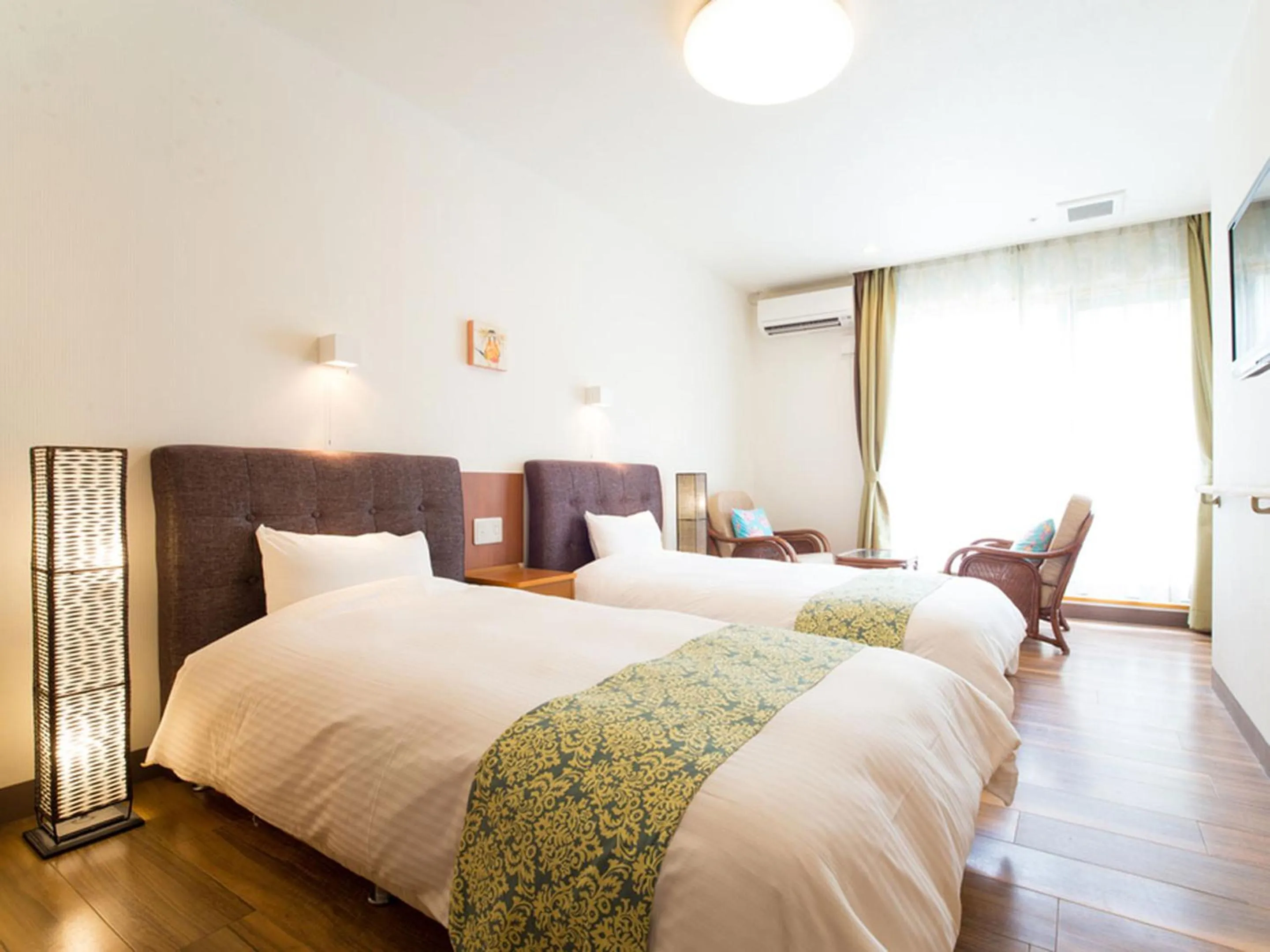 Photo of the whole room, Bed in Sun Green Resort Hotel Ishigaki