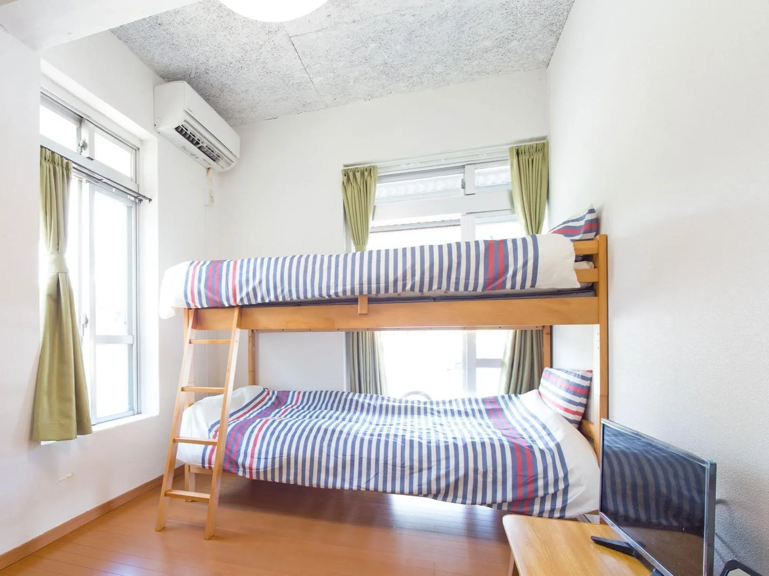 Bed in Sun Green Resort Hotel Ishigaki