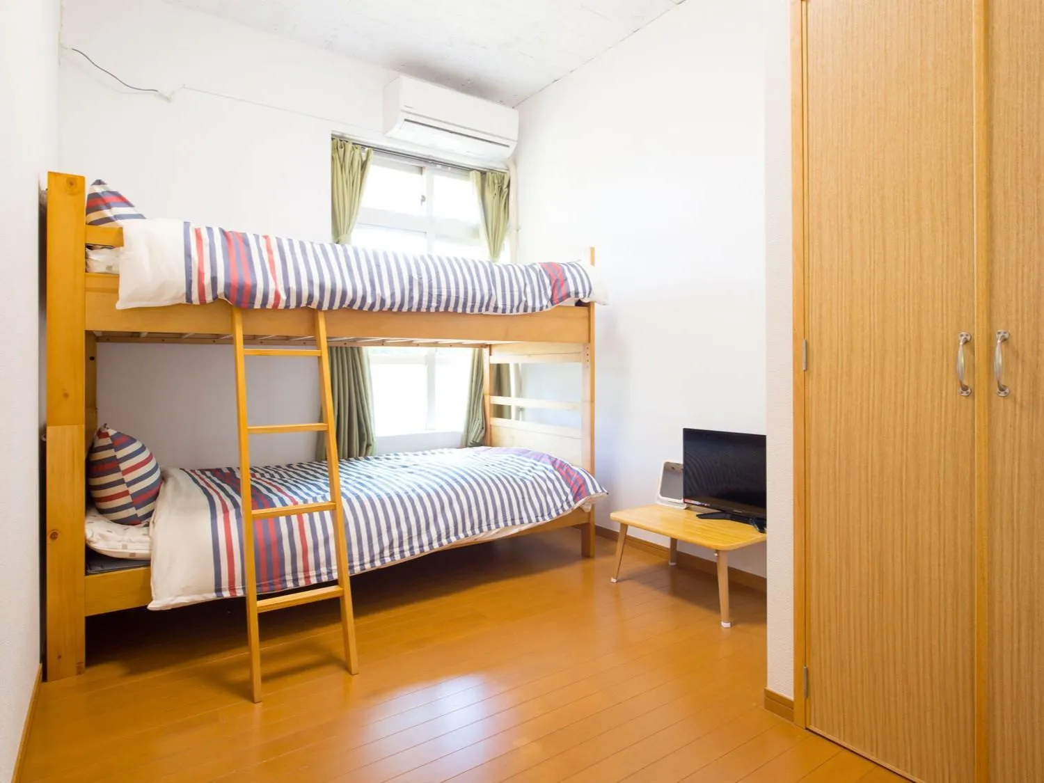 Bed in Sun Green Resort Hotel Ishigaki