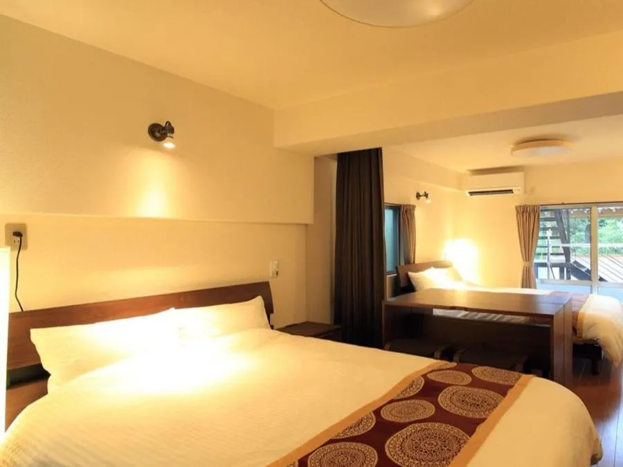 Bed in Sun Green Resort Hotel Ishigaki