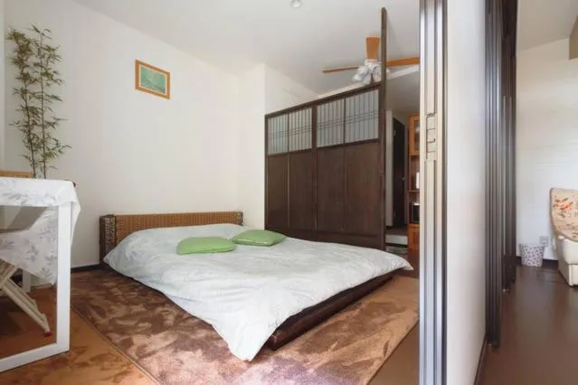 Bedroom, Bed in Osaka Nakayama Guesthouse