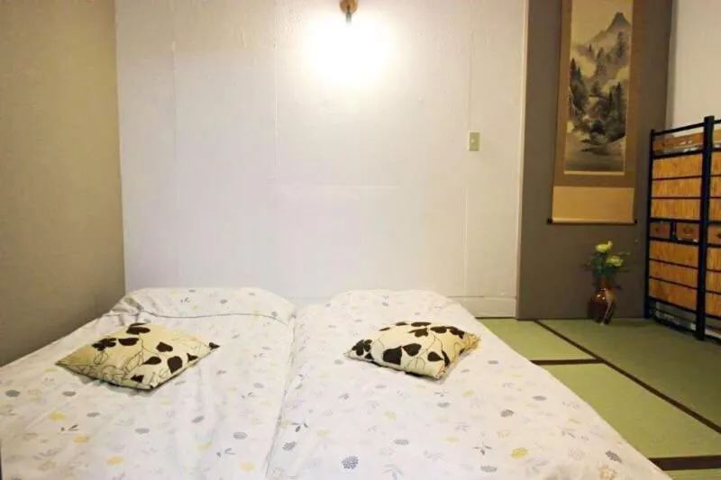 Bedroom, Bed in Osaka Nakayama Guesthouse