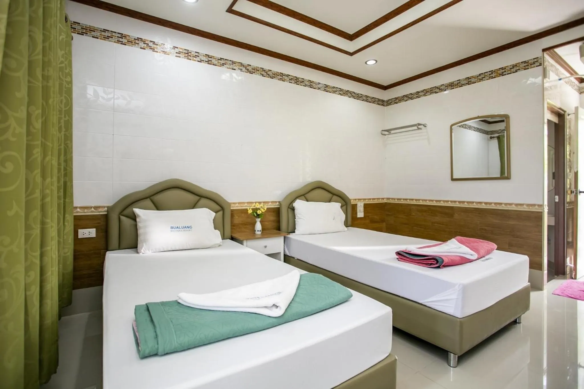 Photo of the whole room, Bed in Bualuang Boutique Resort