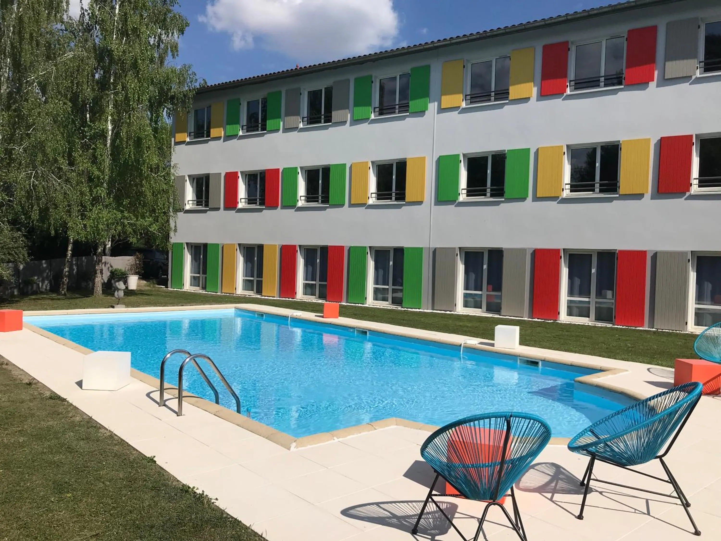 Property building, Swimming Pool in Hotel Full Colors