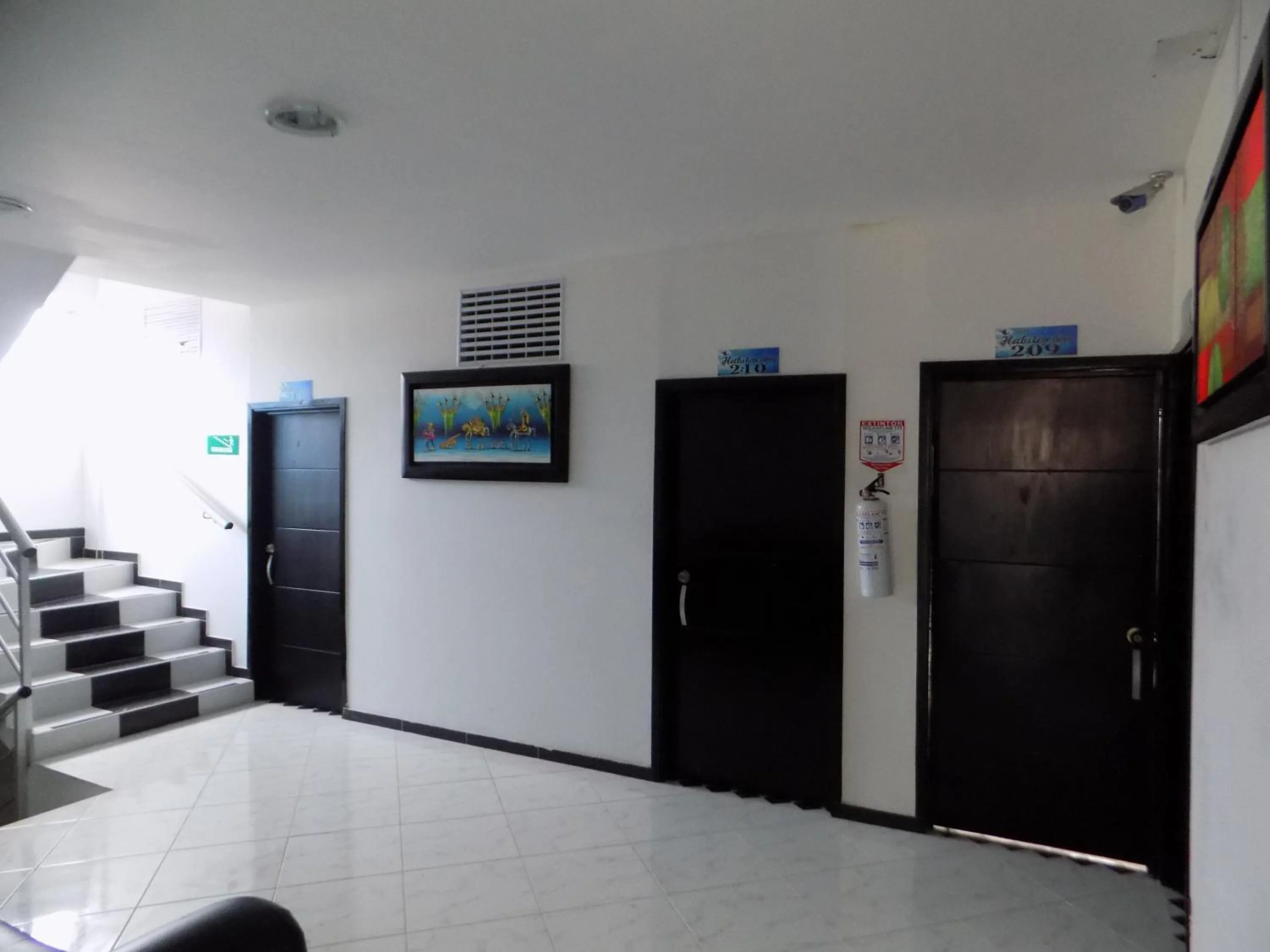 Communal lounge/ TV room in Hotel Luna Azul