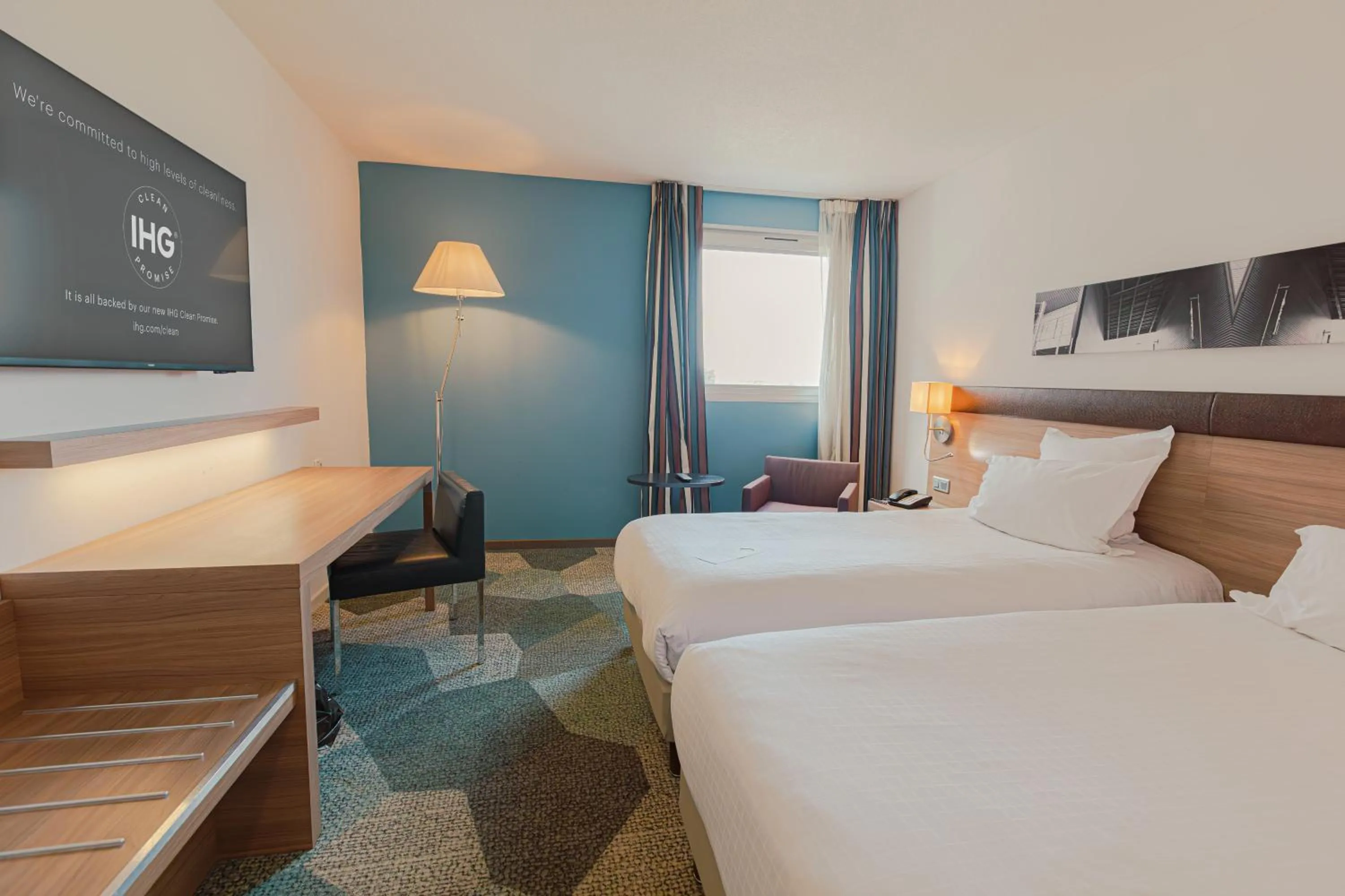 Photo of the whole room, Bed in Holiday Inn Mulhouse by IHG