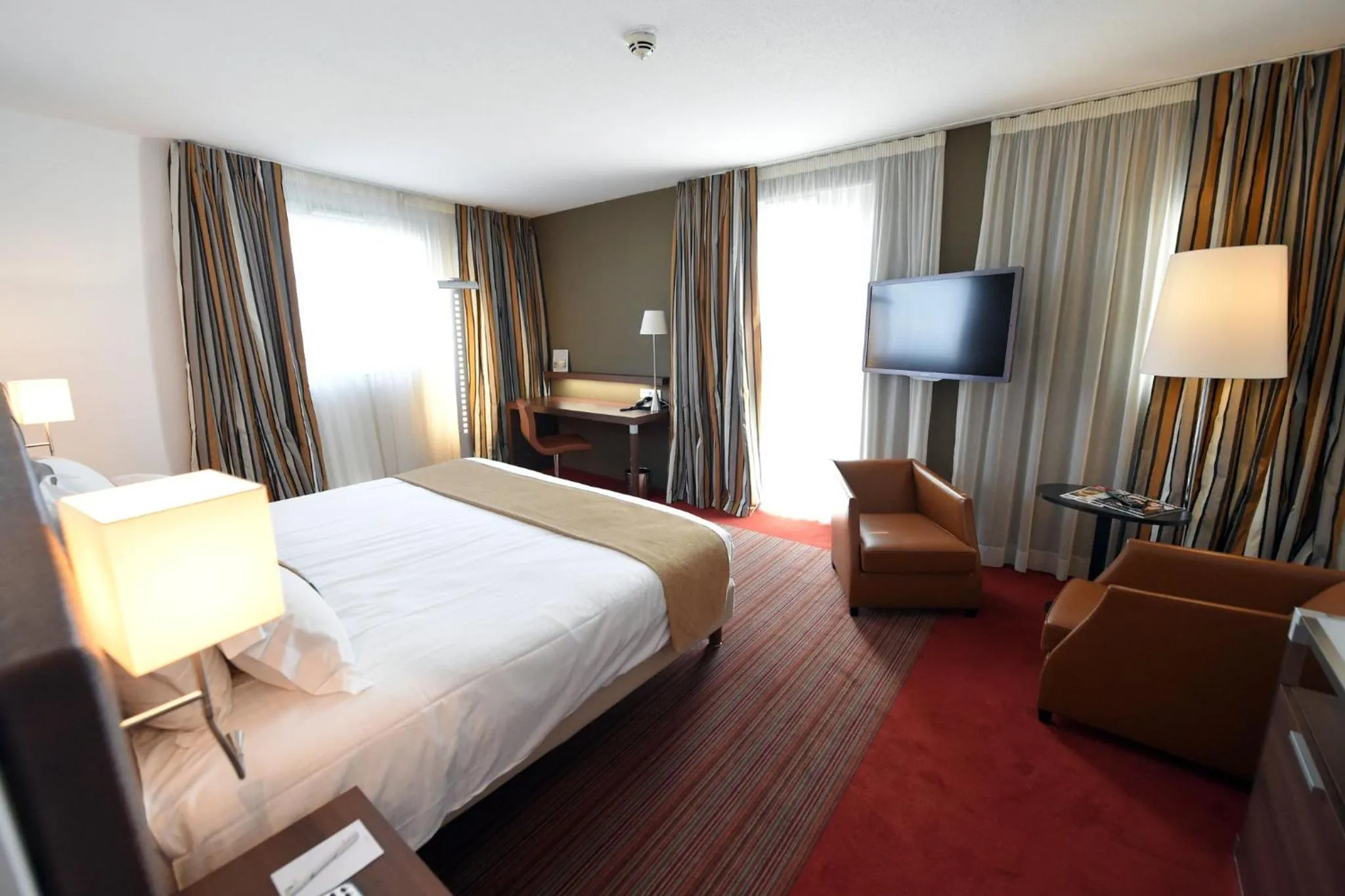 Bedroom, Bed in Holiday Inn Mulhouse by IHG