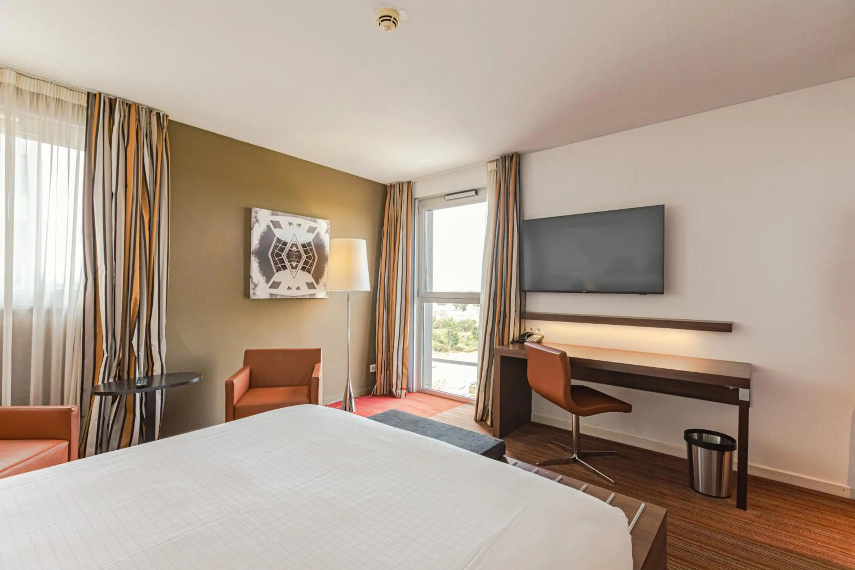 Bed in Holiday Inn Mulhouse by IHG