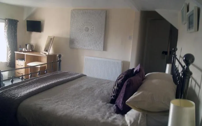 Bed in The Old Smithy Bed & Breakfast