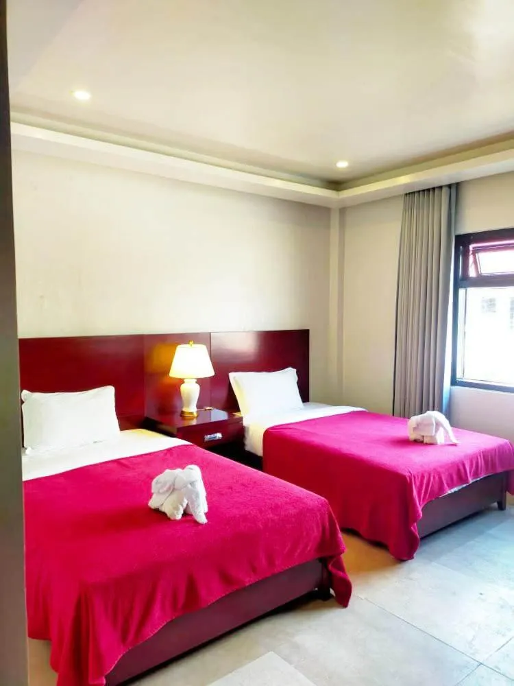 Bed in El Nido Beach Hotel