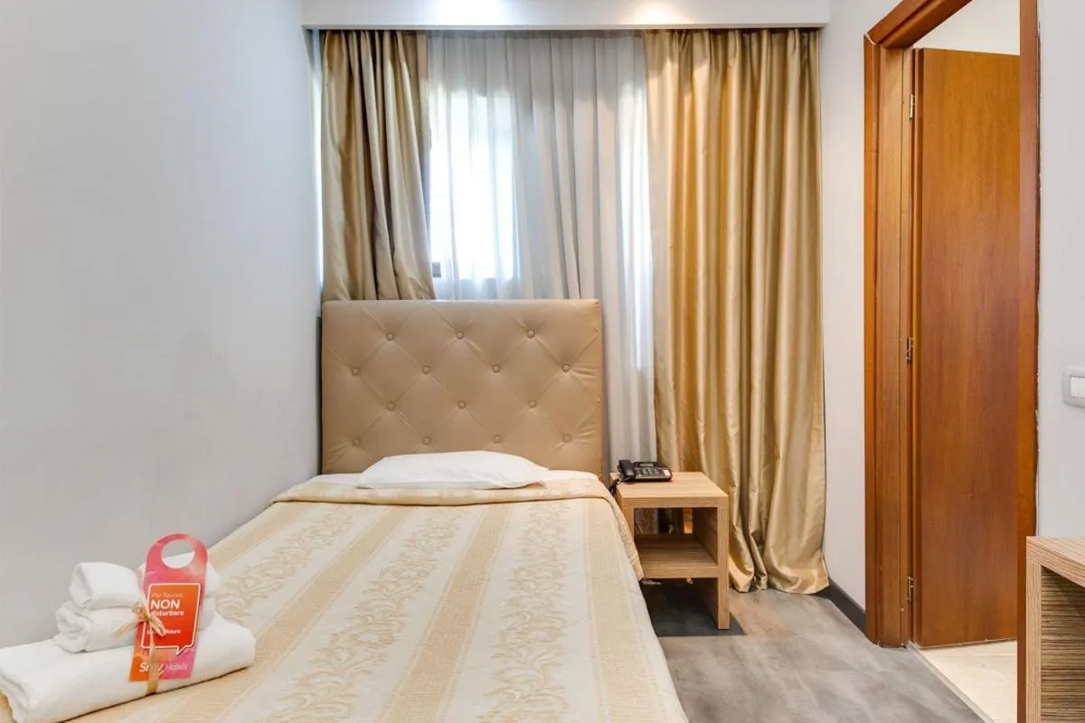 Bedroom in Phi Hotel Garden Area Roma Eur