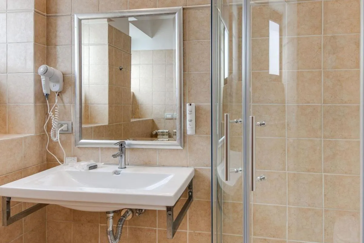 Bathroom in Phi Hotel Garden Area Roma Eur