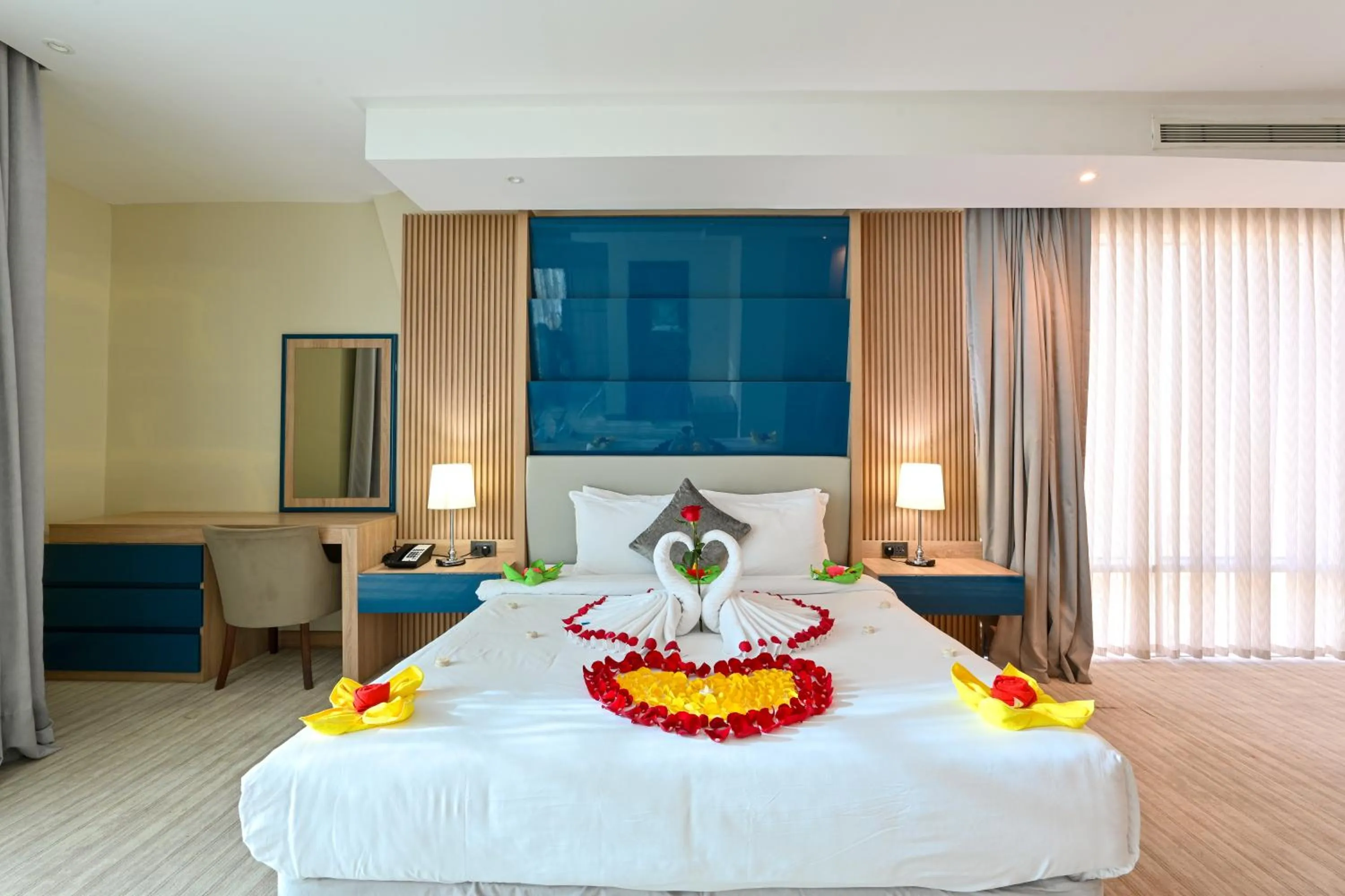 Bed in Al Mansour Suites Hotel