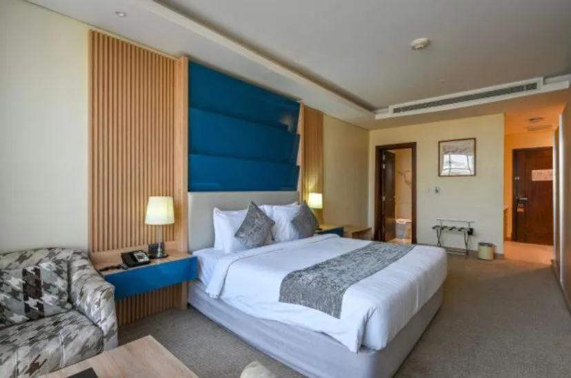 Photo of the whole room, Bed in Al Mansour Suites Hotel