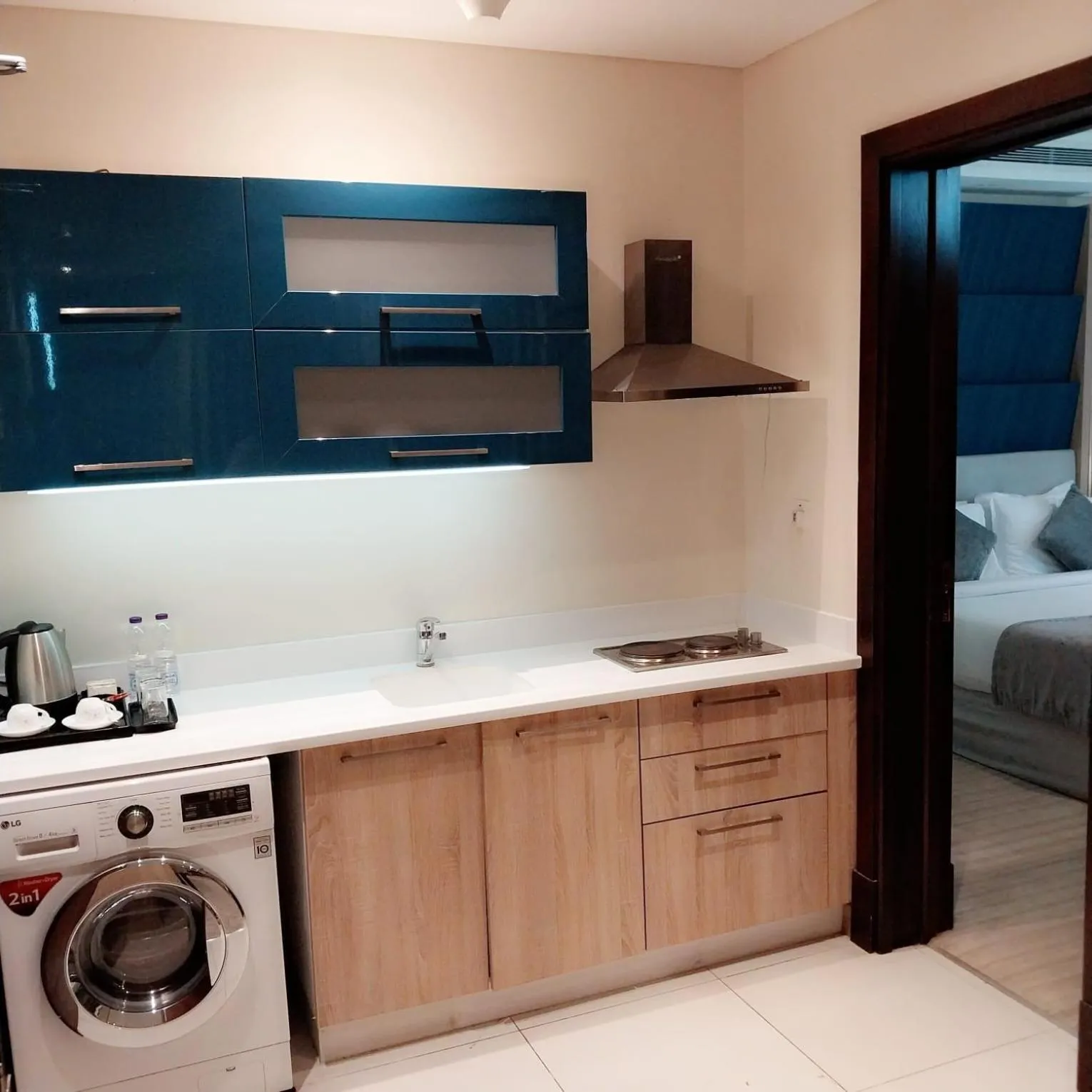 Kitchen or kitchenette in Al Mansour Suites Hotel