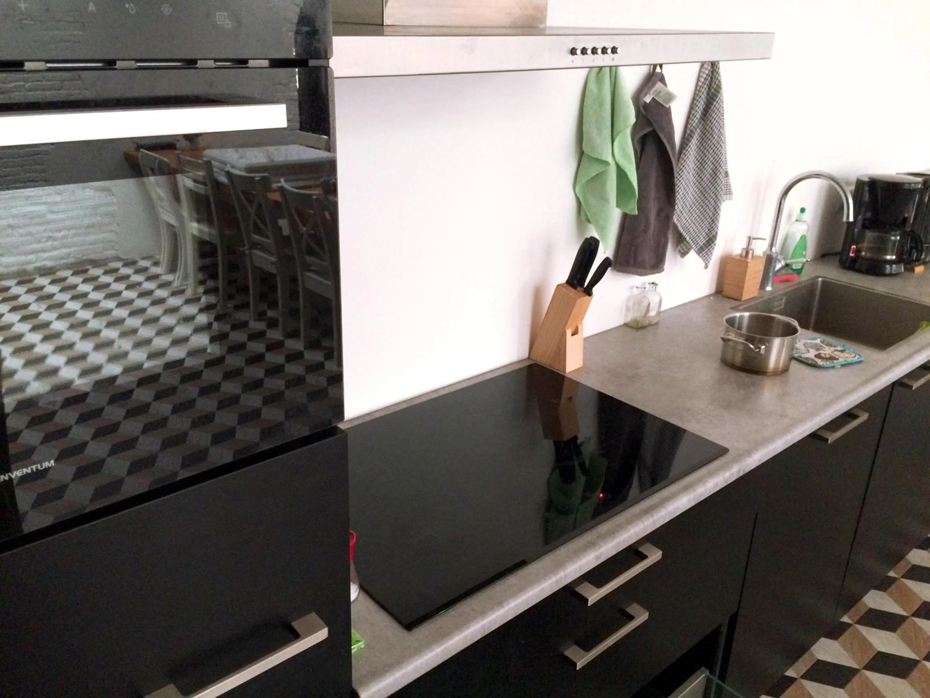 Communal kitchen in The Black Sheep Hostel