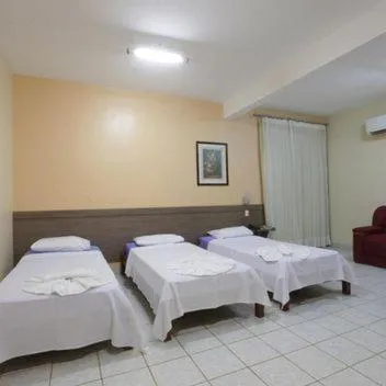 Bed in Augustu's Hotel