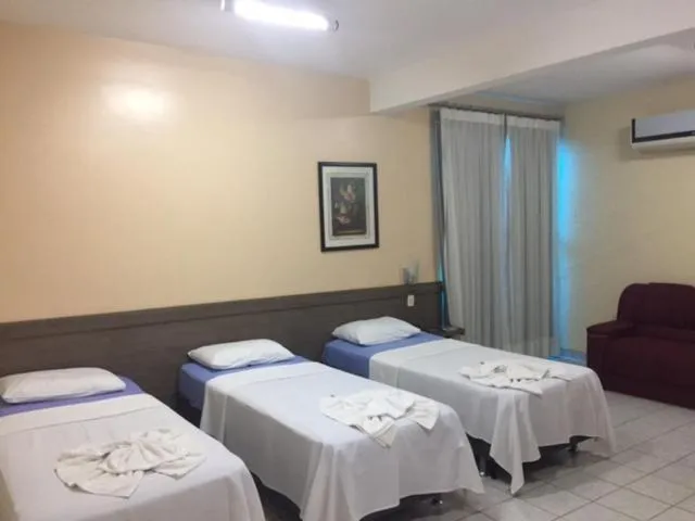 Bed in Augustu's Hotel