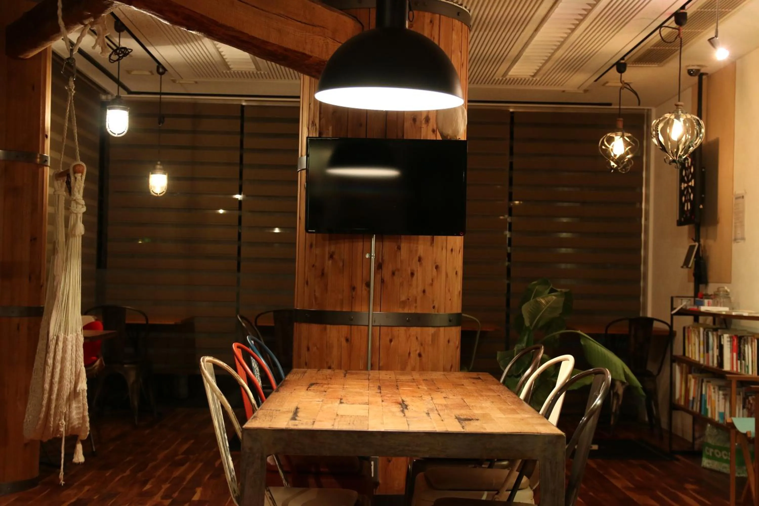 Communal lounge/ TV room in 365BASE outdoor hostel