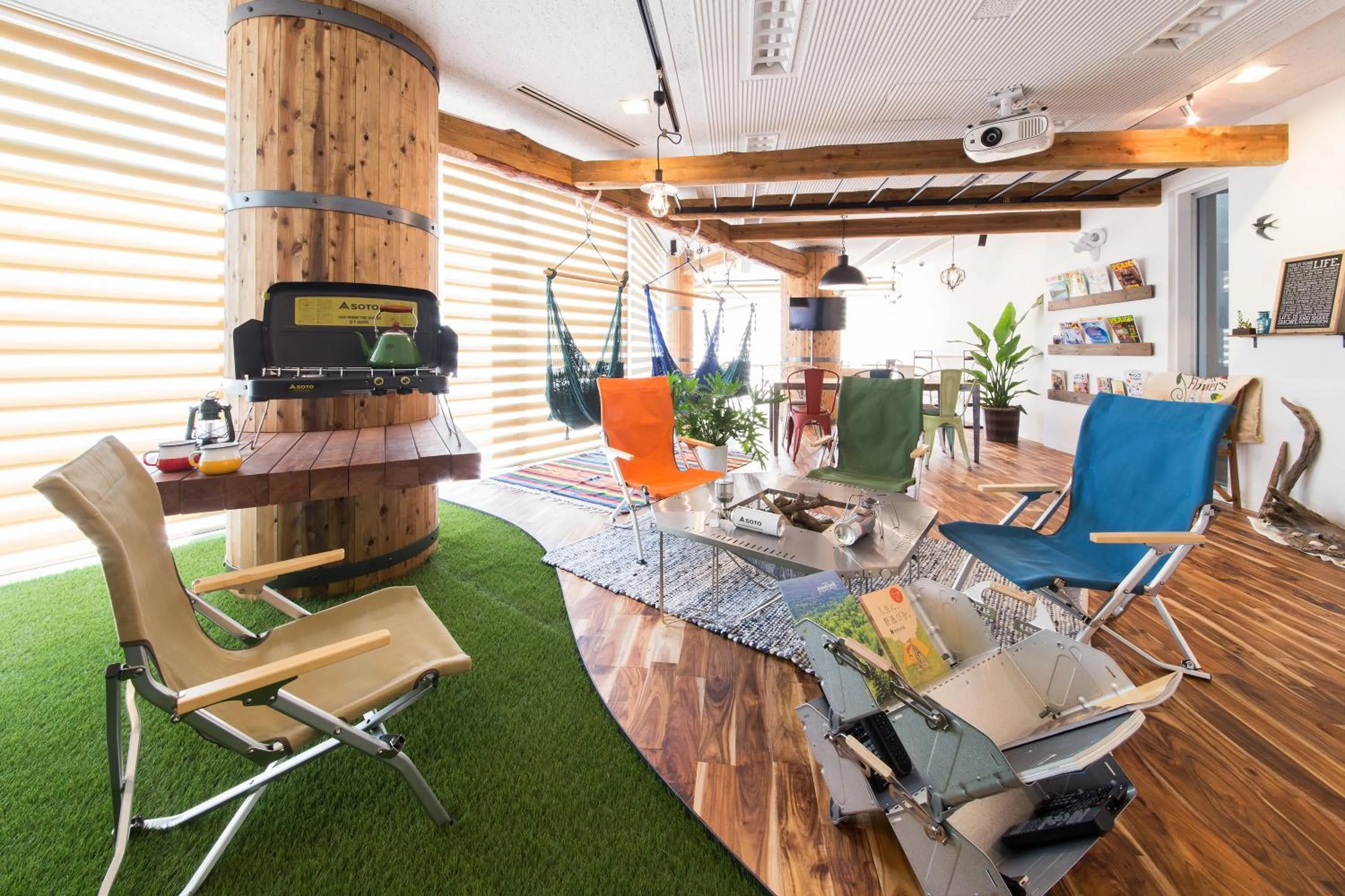 Communal lounge/ TV room in 365BASE outdoor hostel