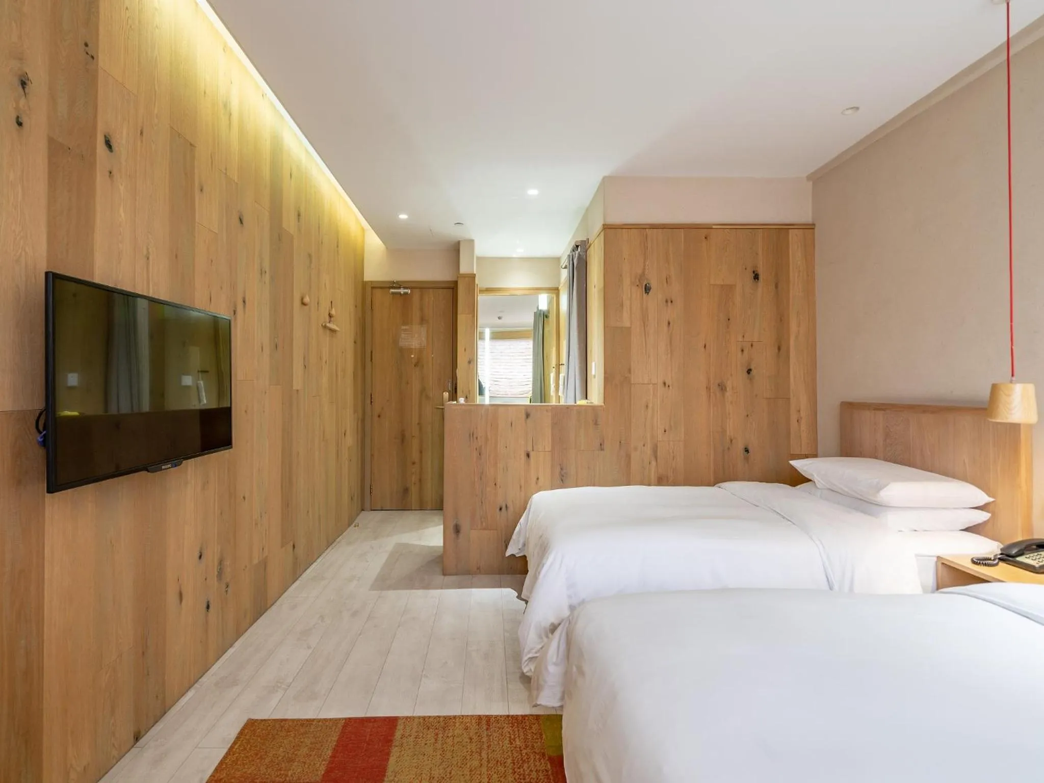 Photo of the whole room, Bed in EBO Hotel Zijin gang Asian Games Park Store Zhejiang university