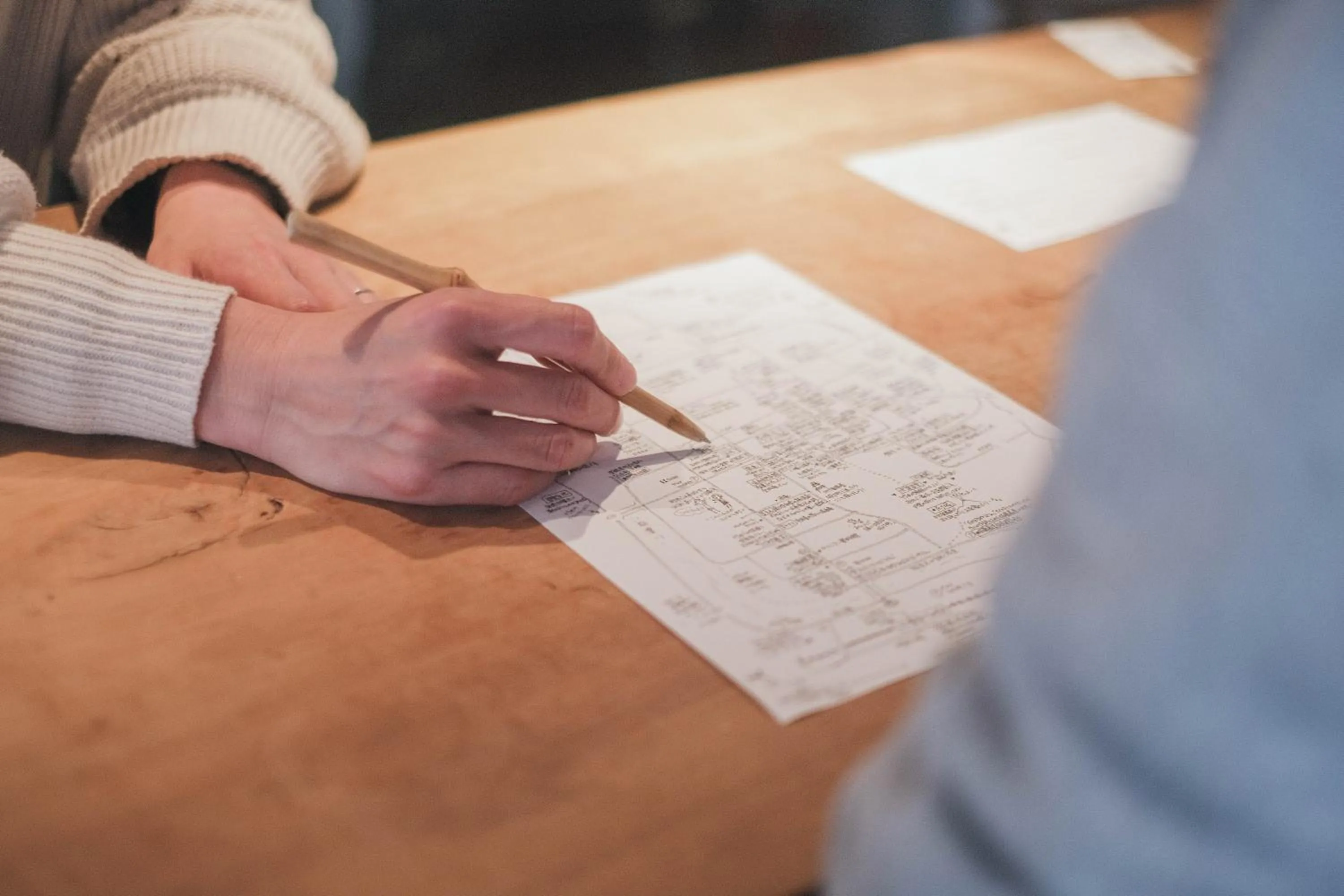 People in Taketa Ekimae Hostel cue