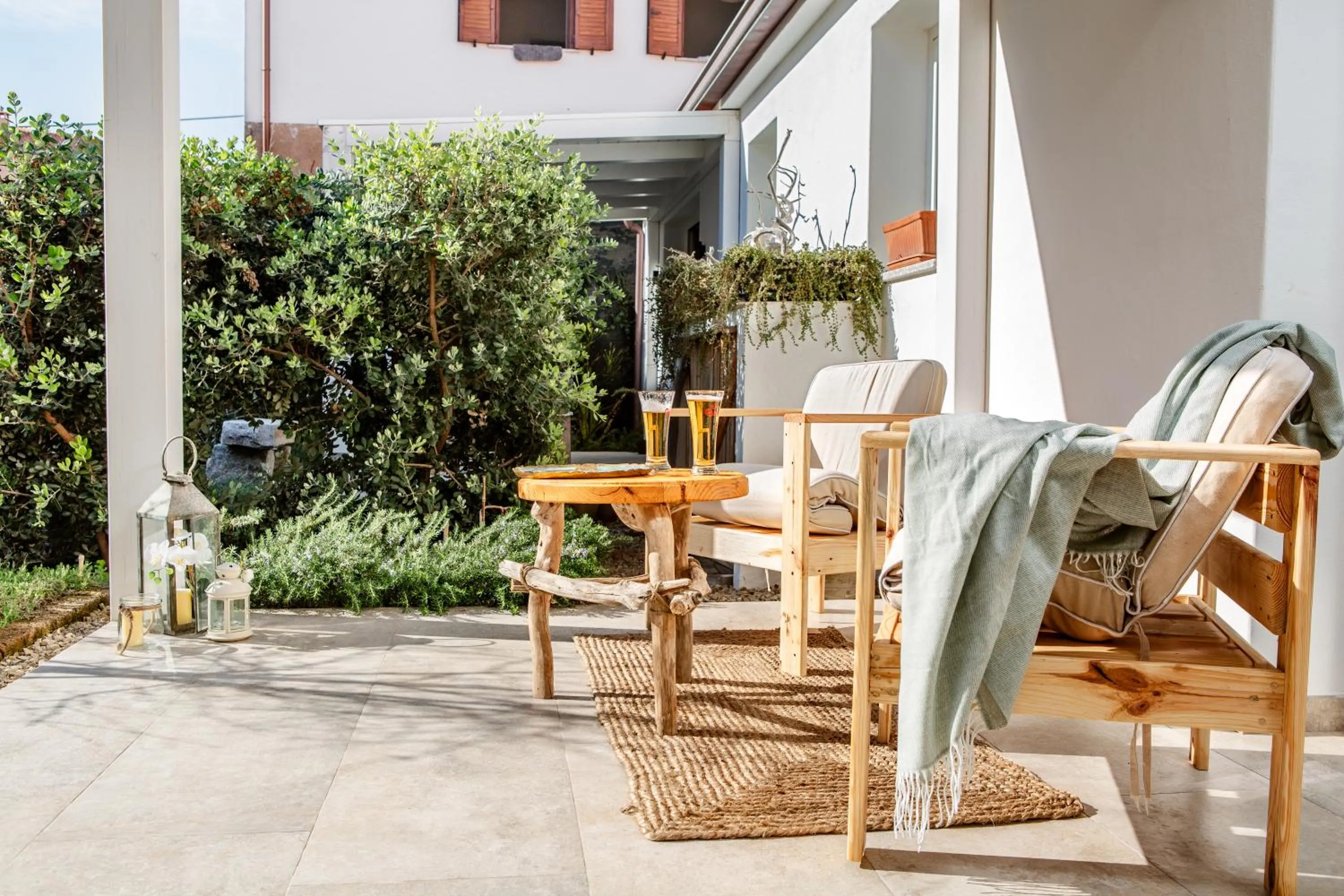 Patio in B&B Les Chambres Rooms & Suite