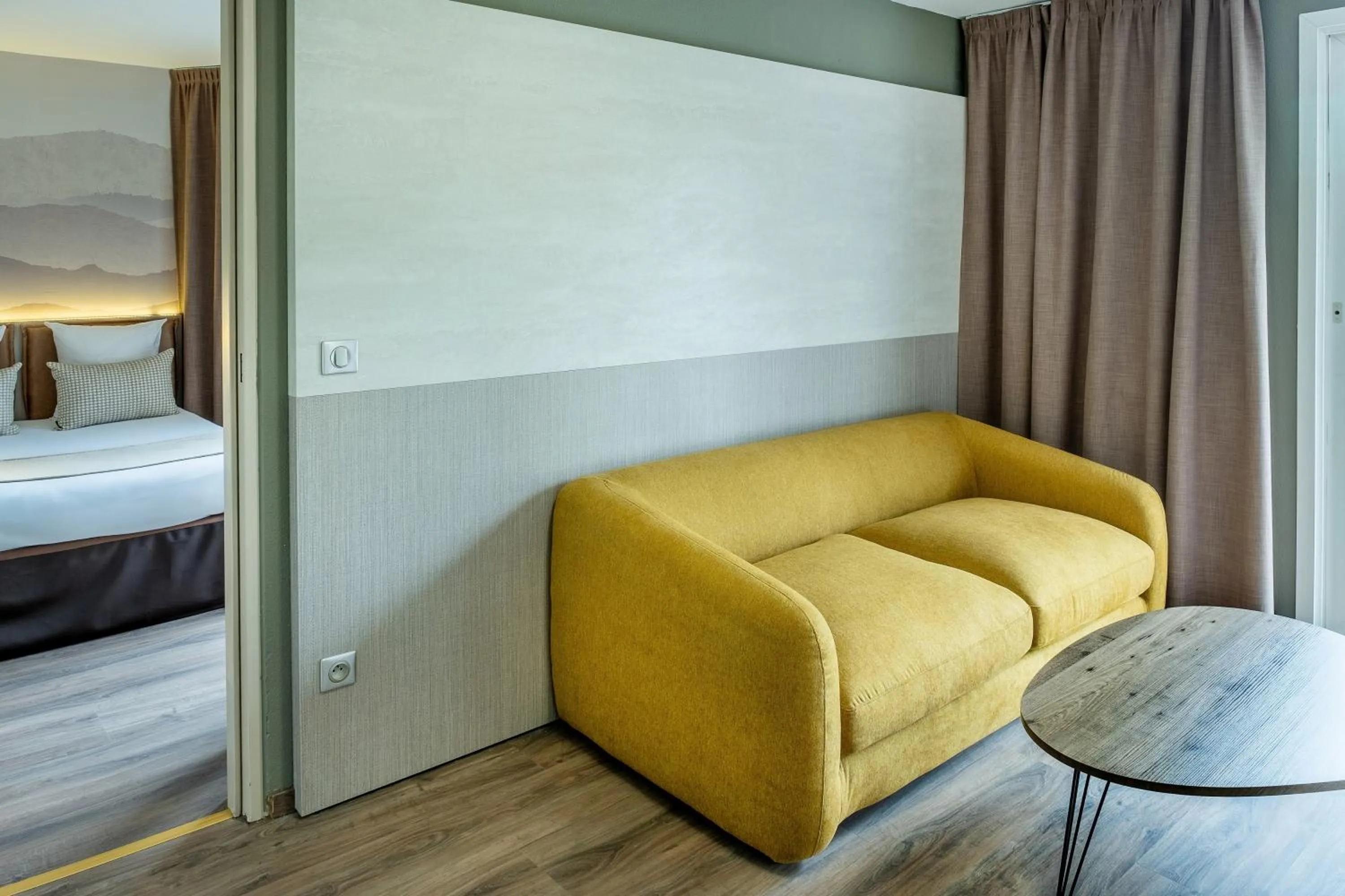 Seating area, Bed in Hôtel La Solitude