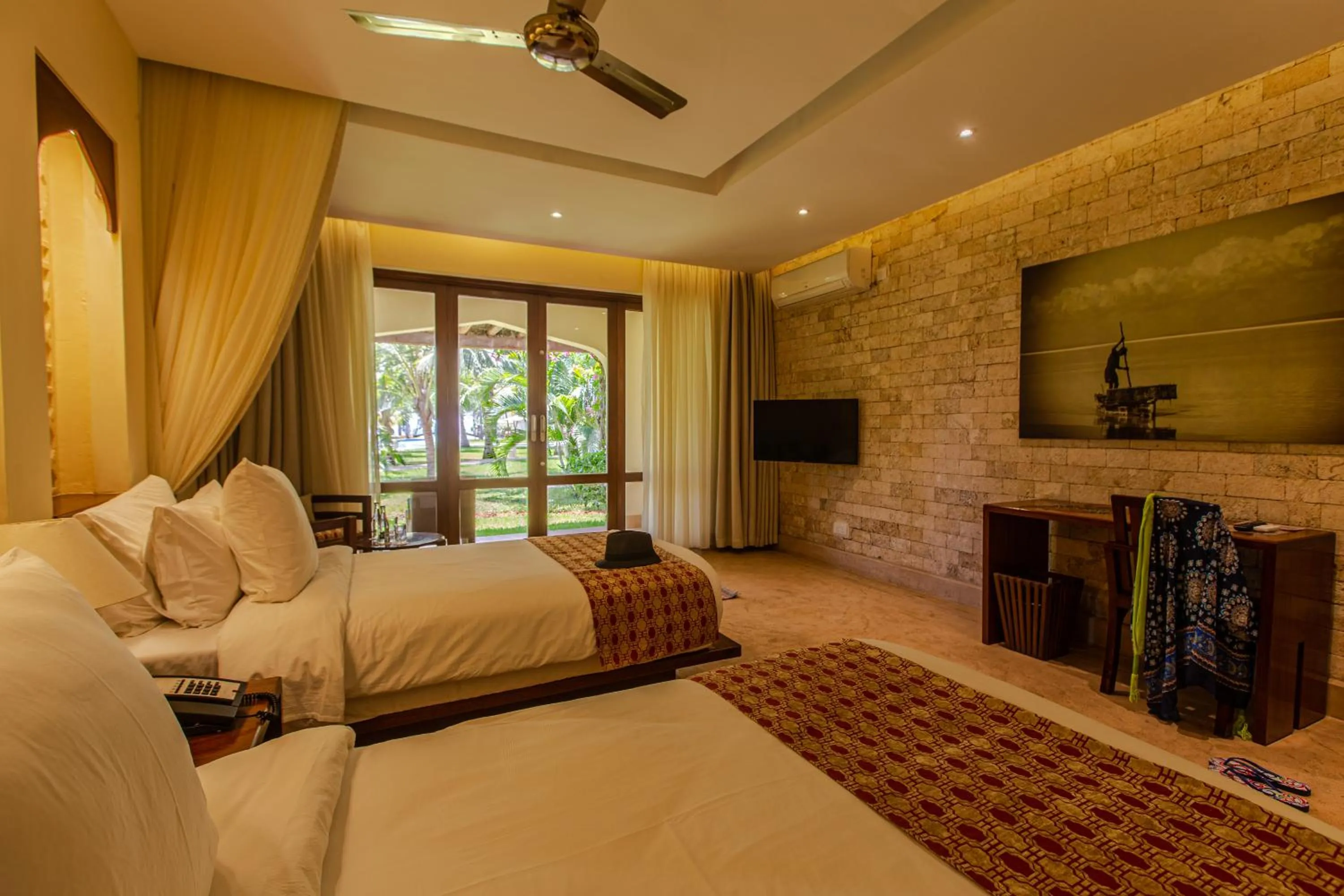 Bed in Silver Palm Spa & Resort