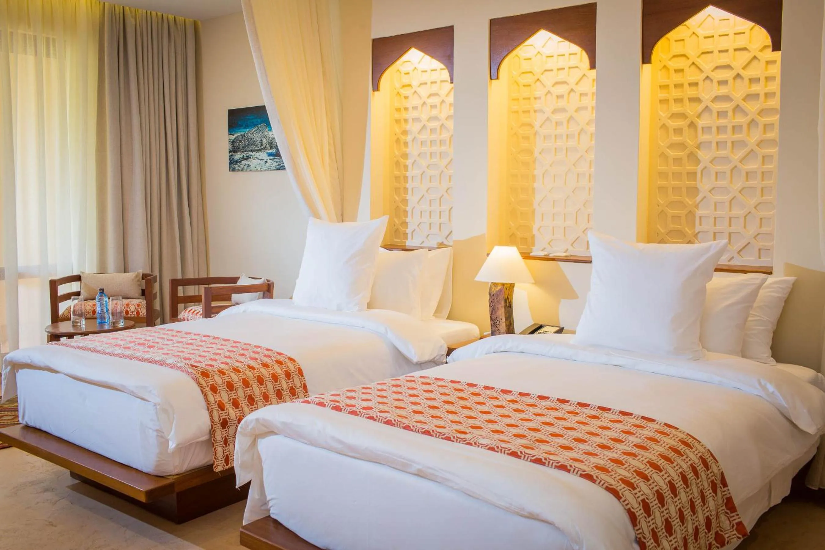 Bed in Silver Palm Spa & Resort