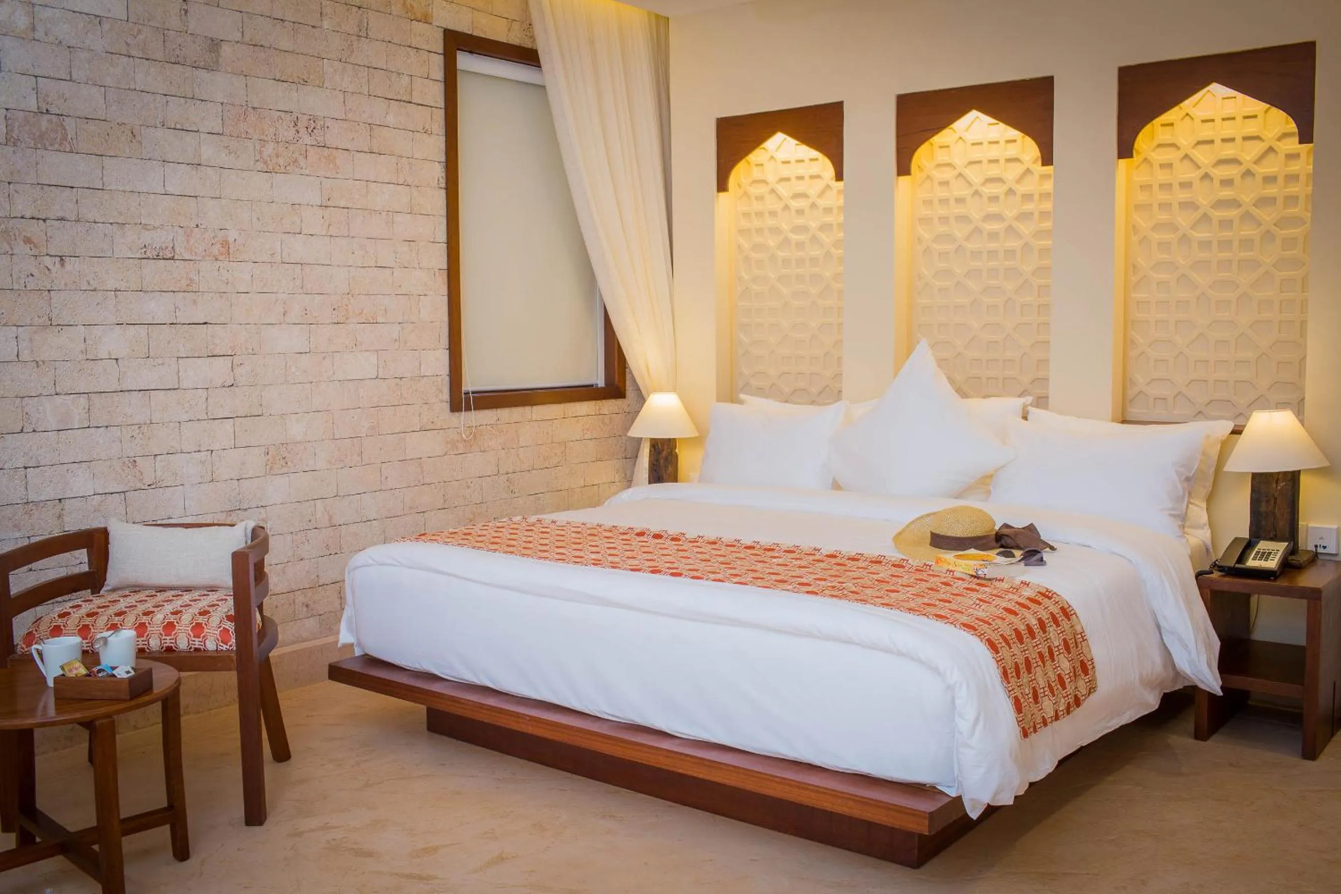 Bed in Silver Palm Spa & Resort