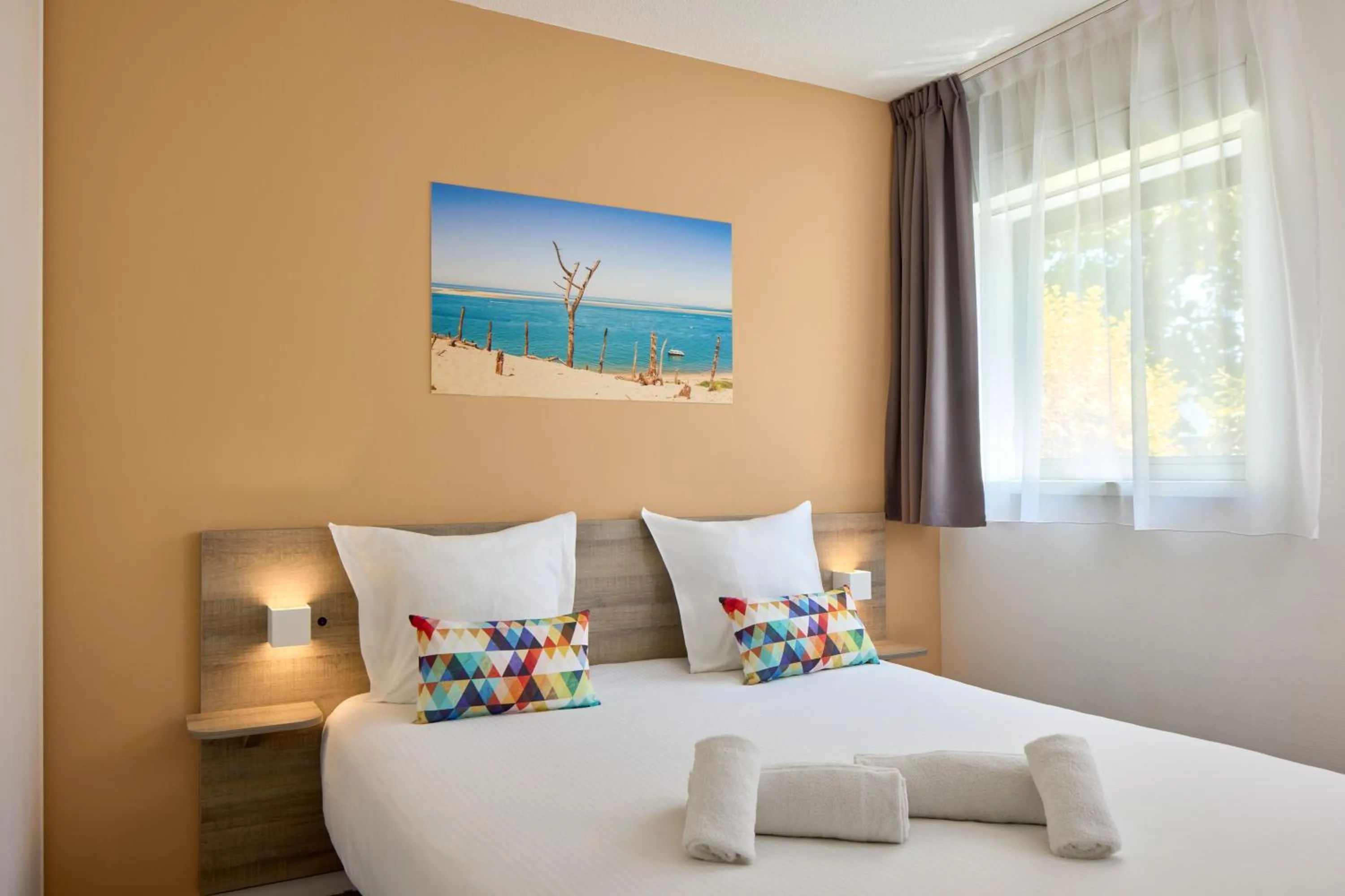 Bed in Zenitude Hôtel-Résidences Bordeaux Aéroport Mérignac