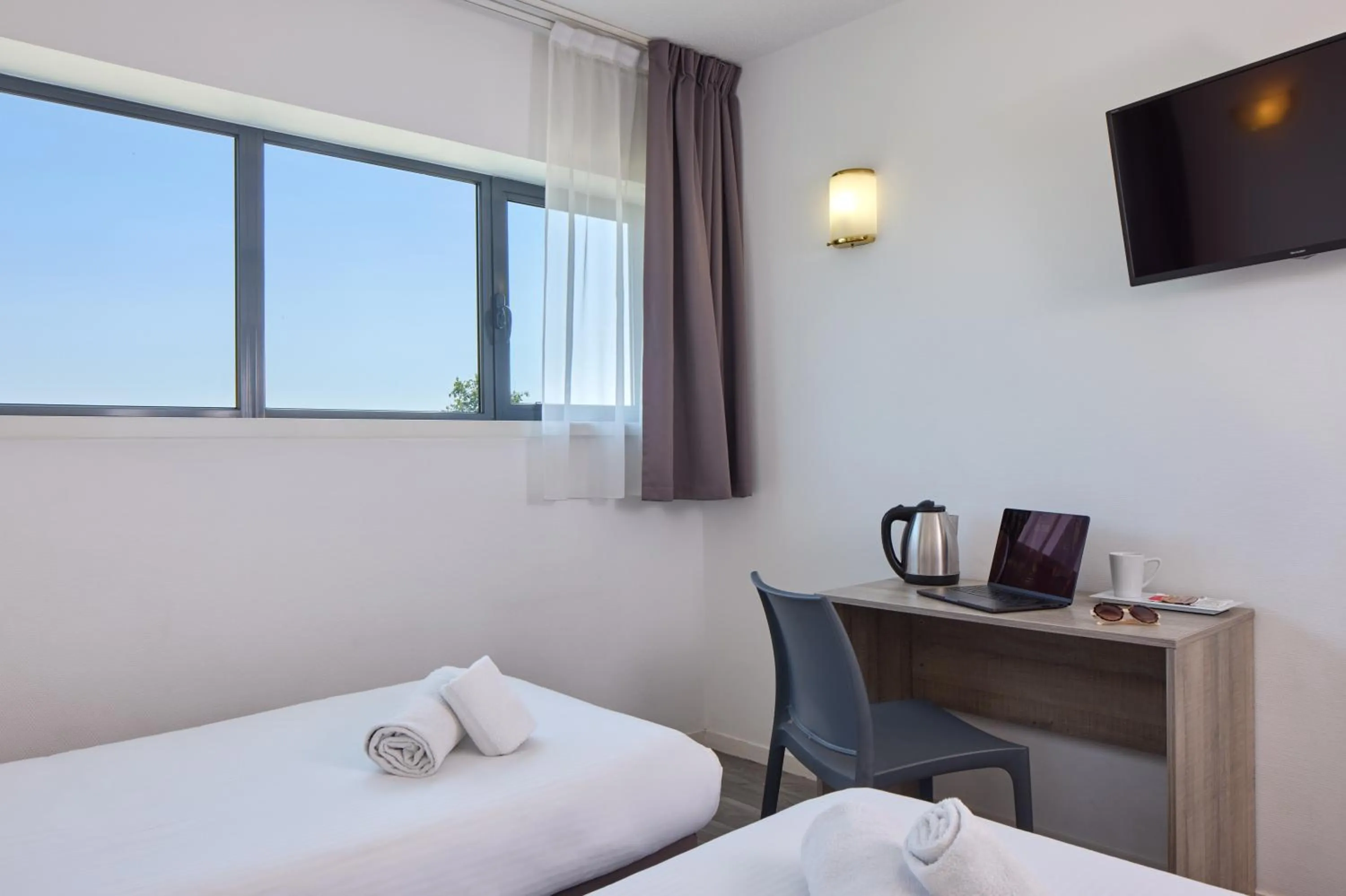 Bed in Zenitude Hôtel-Résidences Bordeaux Aéroport Mérignac