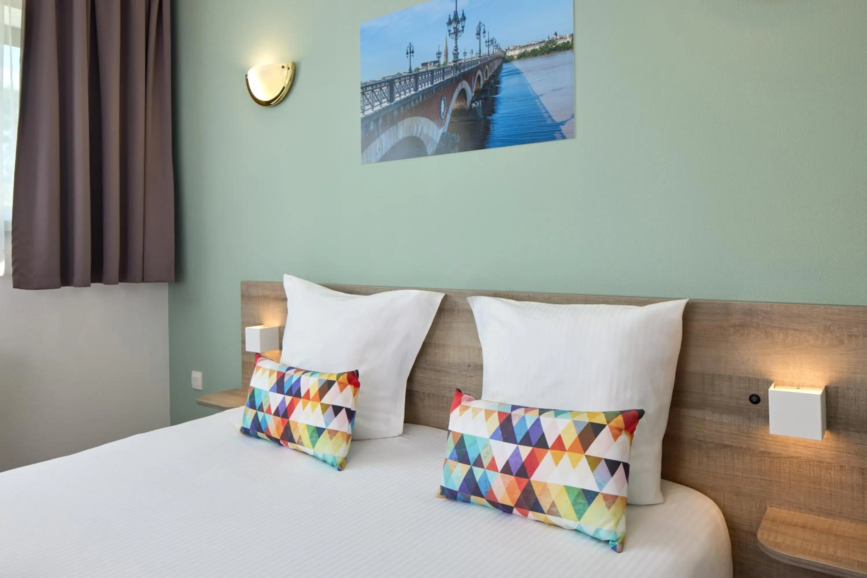 Bed in Zenitude Hôtel-Résidences Bordeaux Aéroport Mérignac