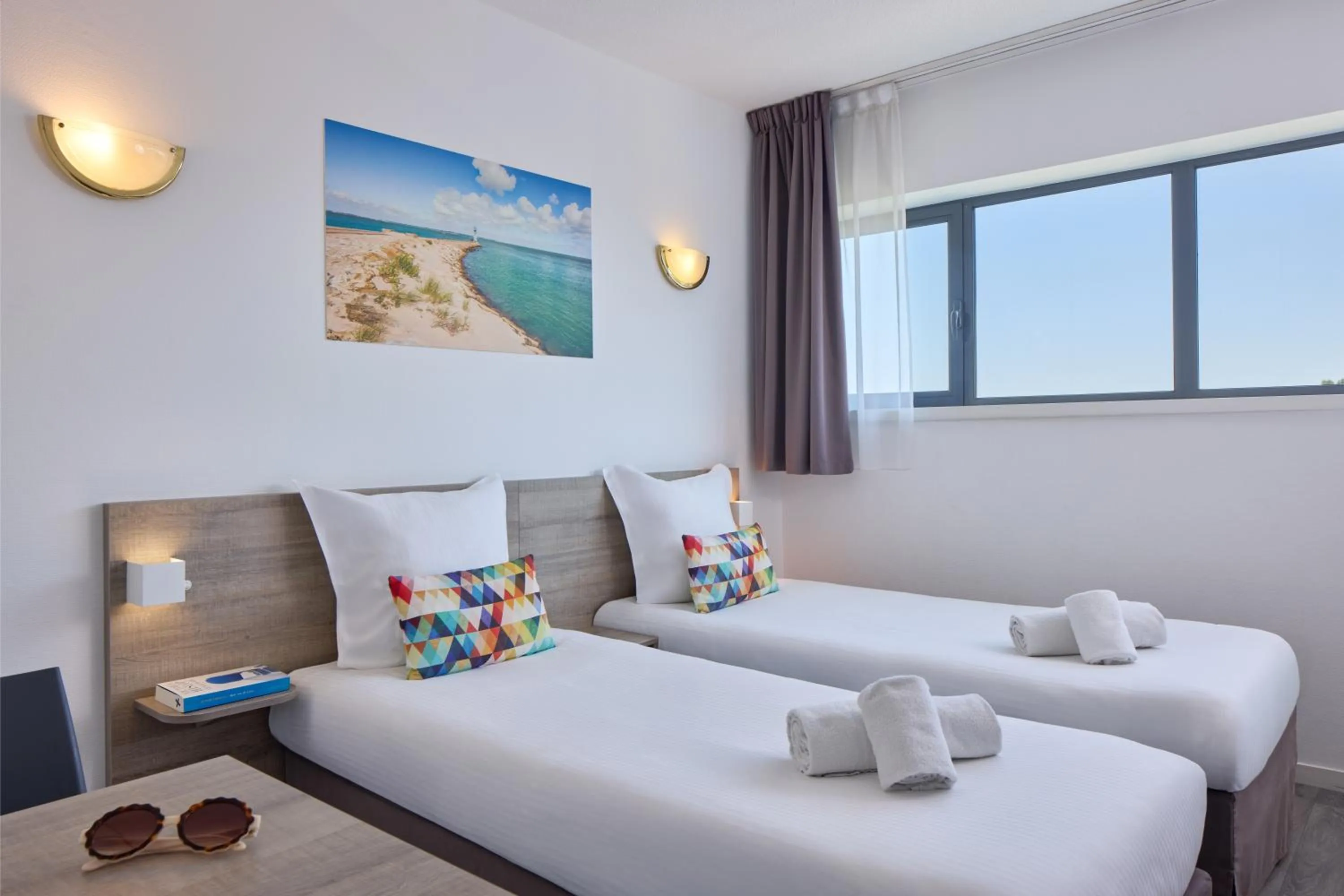 Bed in Zenitude Hôtel-Résidences Bordeaux Aéroport Mérignac