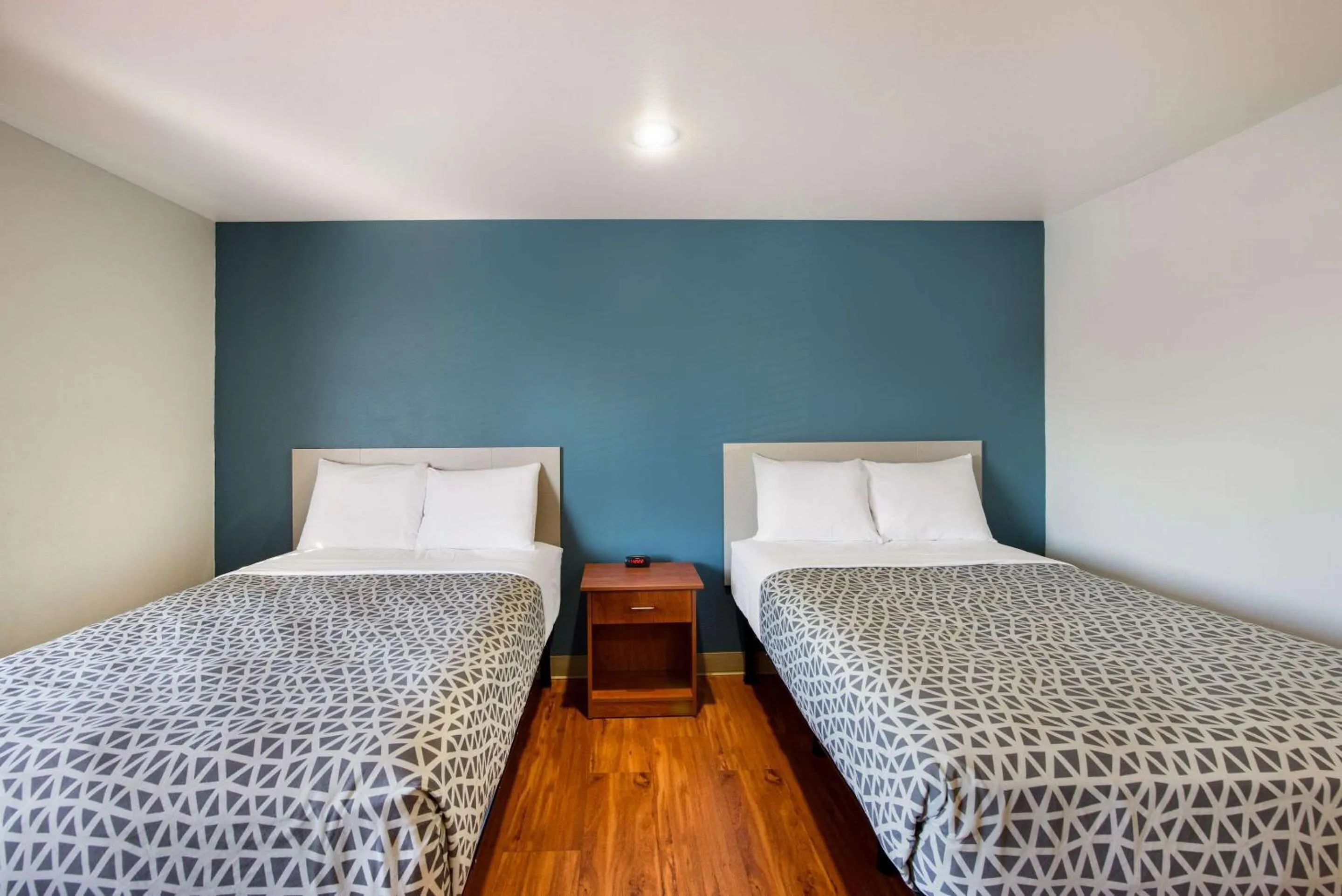 Bedroom, Bed in WoodSpring Suites Columbus Southeast