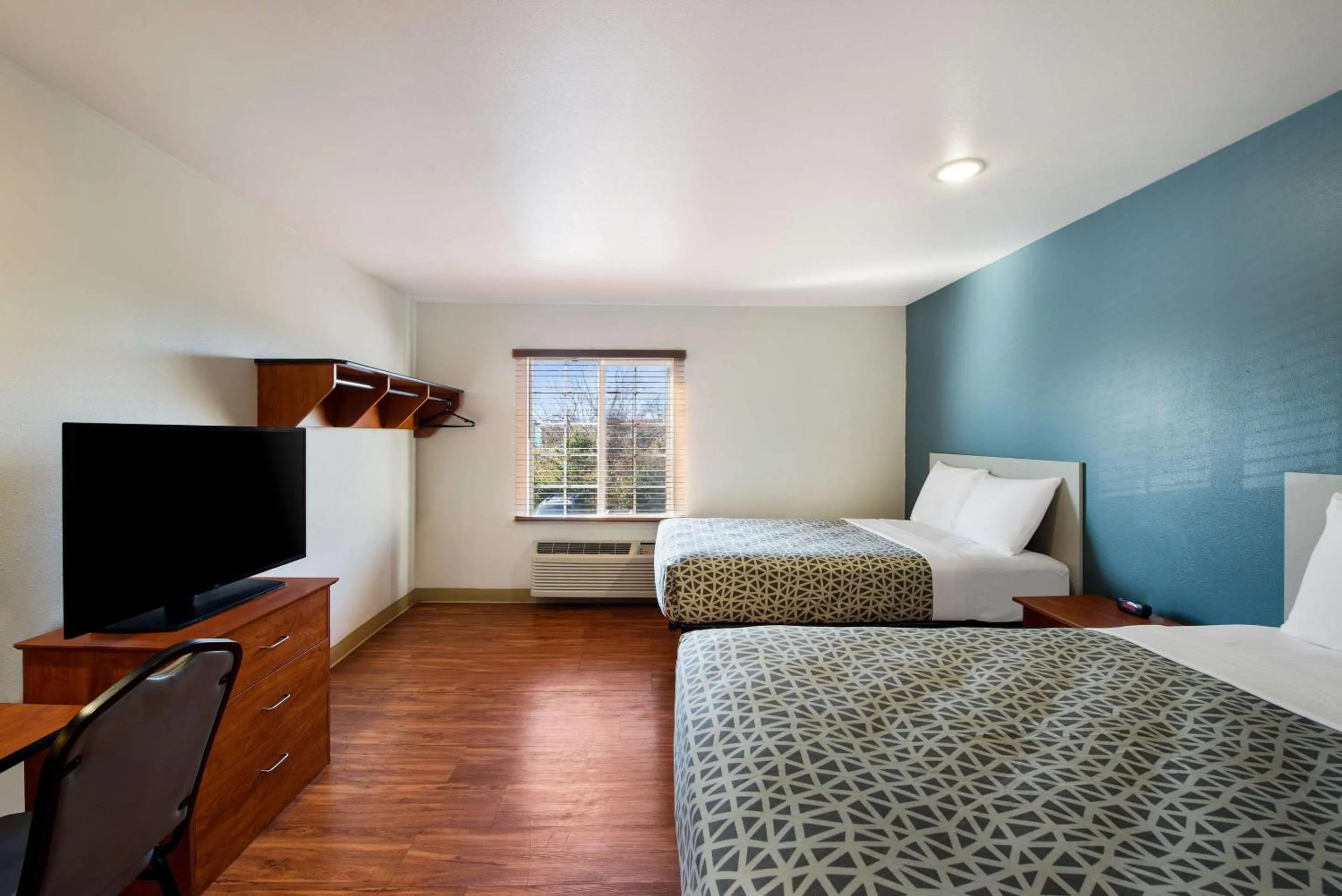Bedroom, Bed in WoodSpring Suites Columbus Southeast
