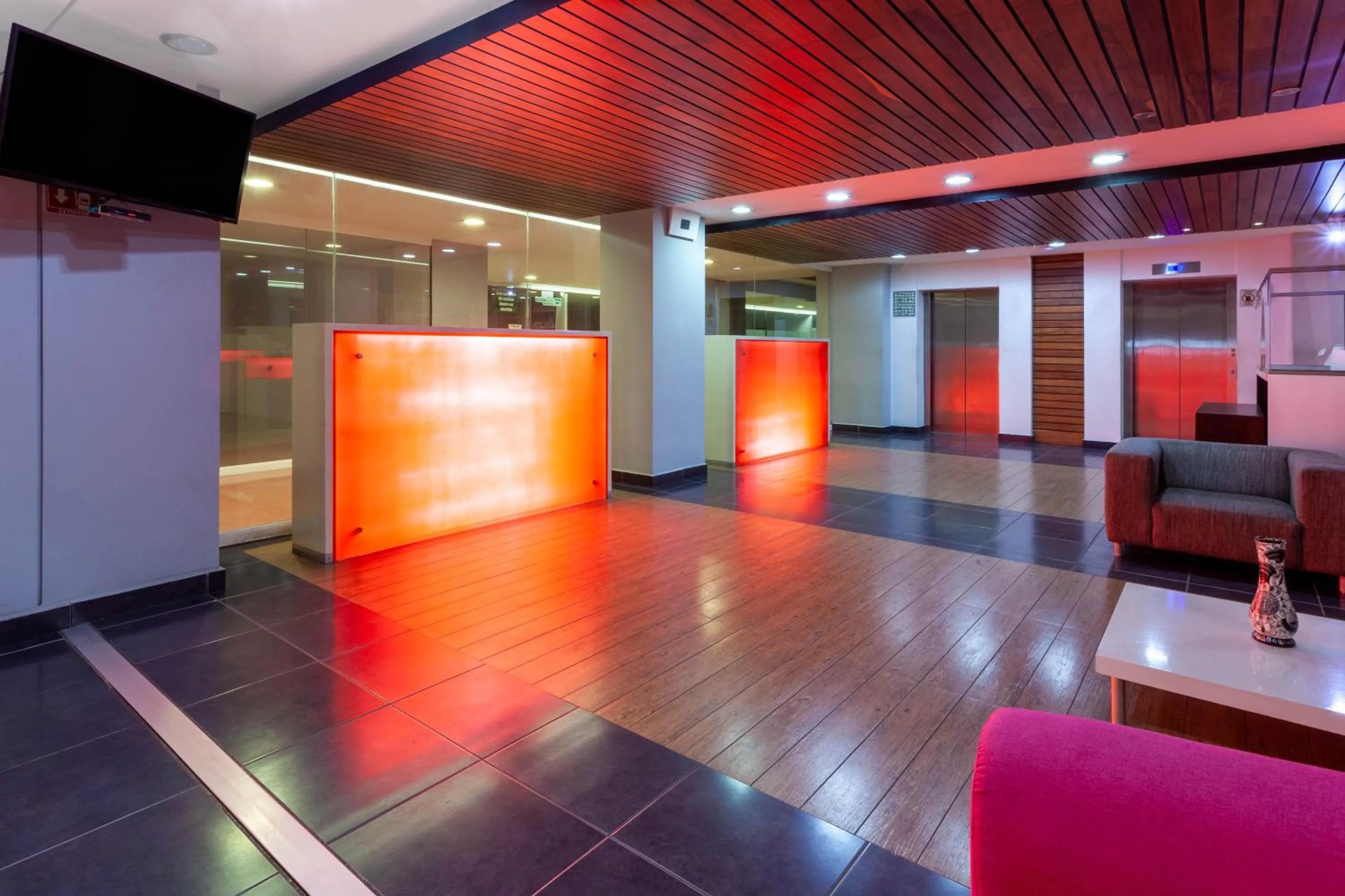 Lobby or reception in Ramada by Wyndham Acapulco Hotel & Suites