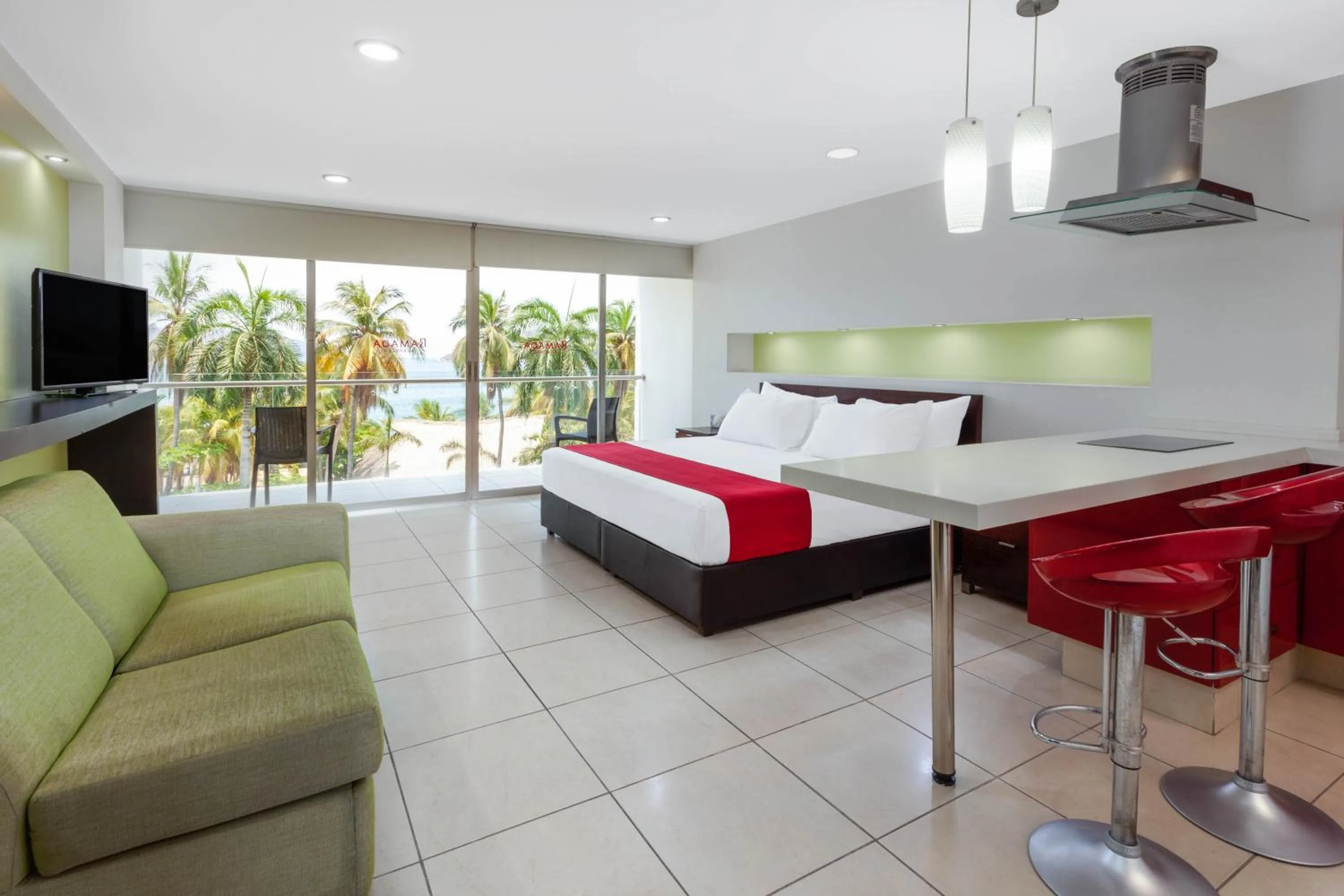 Photo of the whole room, Bed in Ramada by Wyndham Acapulco Hotel & Suites