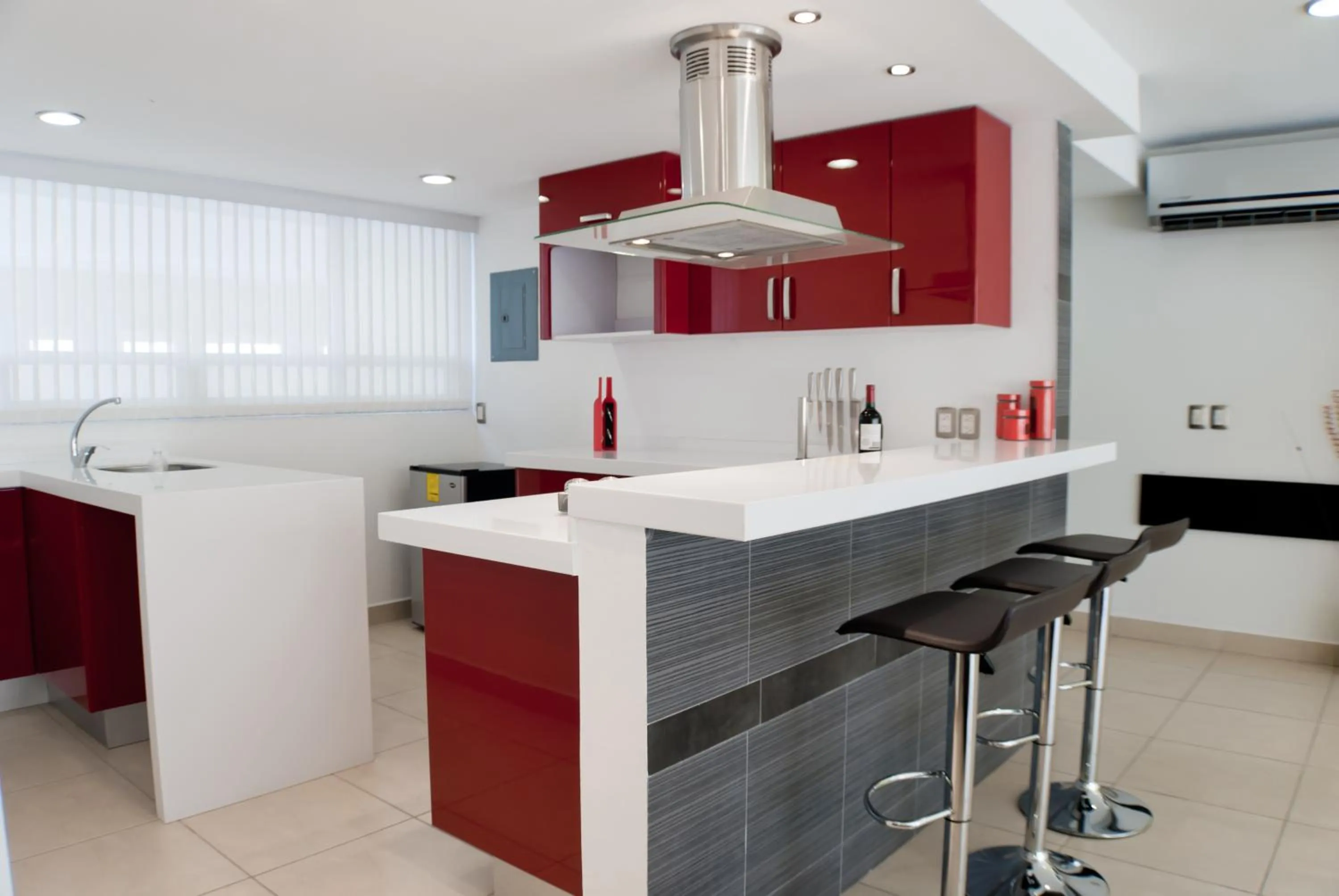 Kitchen or kitchenette in Ramada by Wyndham Acapulco Hotel & Suites