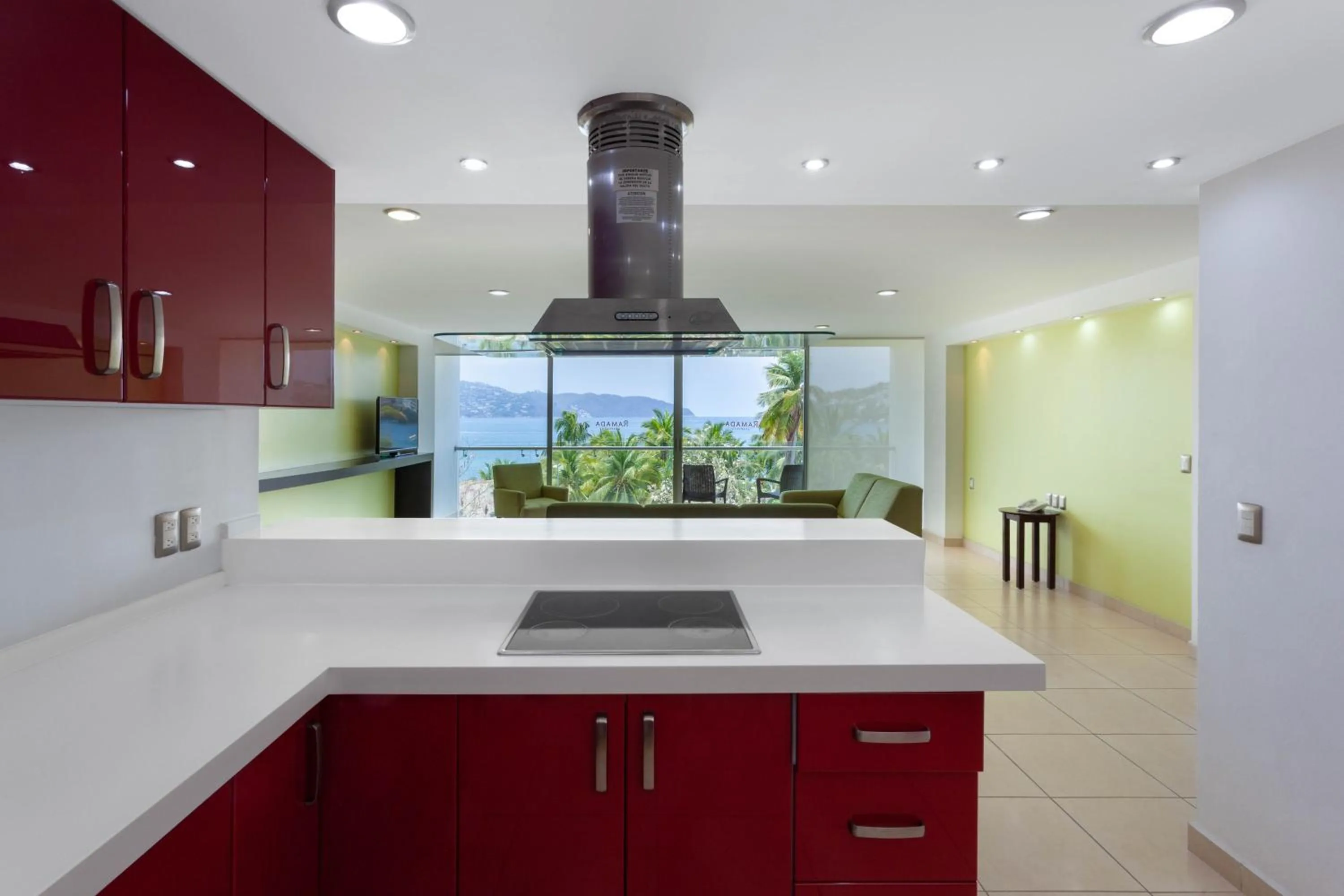 Kitchen or kitchenette in Ramada by Wyndham Acapulco Hotel & Suites