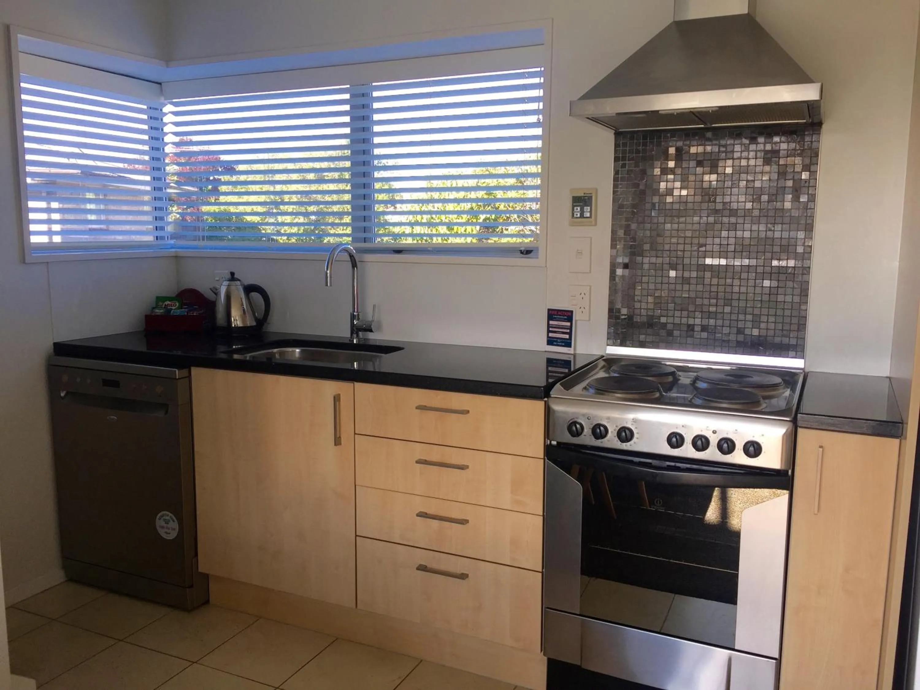 Kitchen or kitchenette in Merivale Apartments