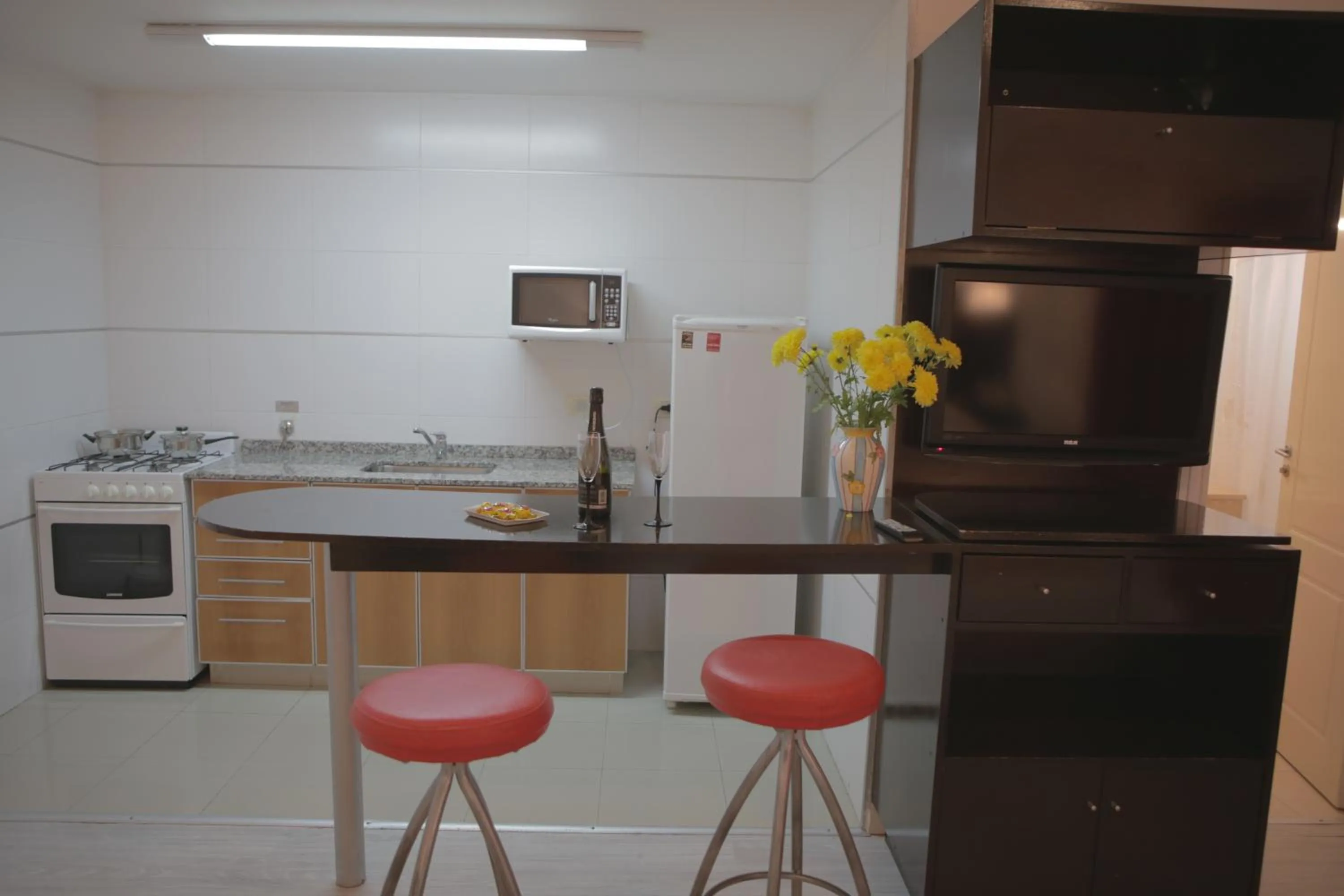 Kitchen or kitchenette in Pampa Plaza Hotel