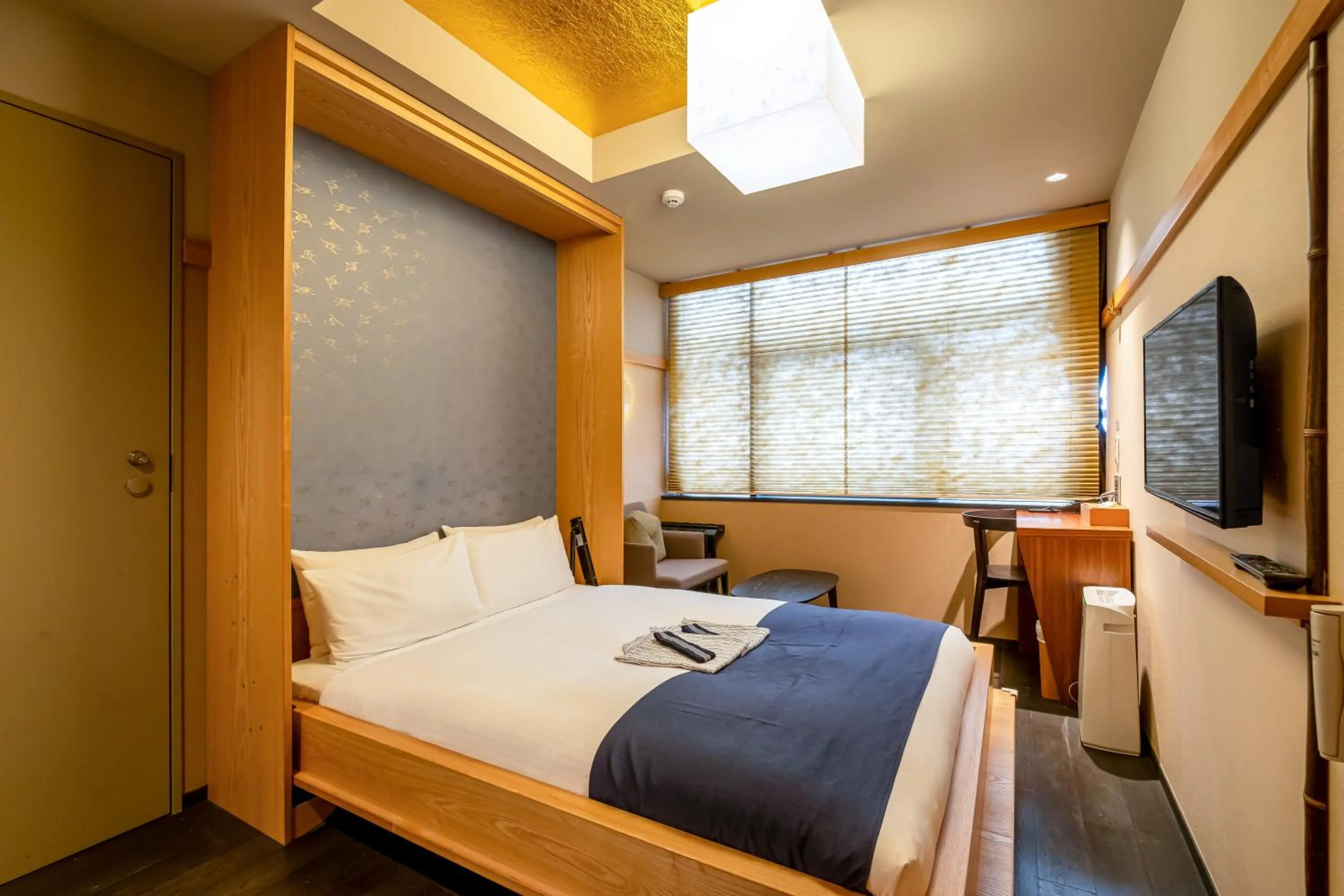 Bed in GOZAN HOTEL & SERVICED APARTMENT Higashiyama Sanjo