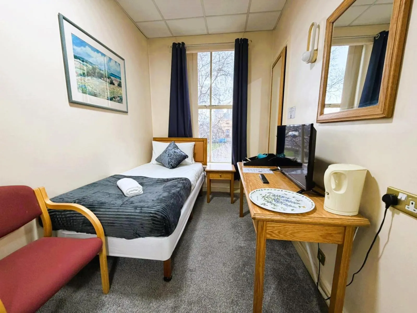 Bed in Throstles Nest Hotel